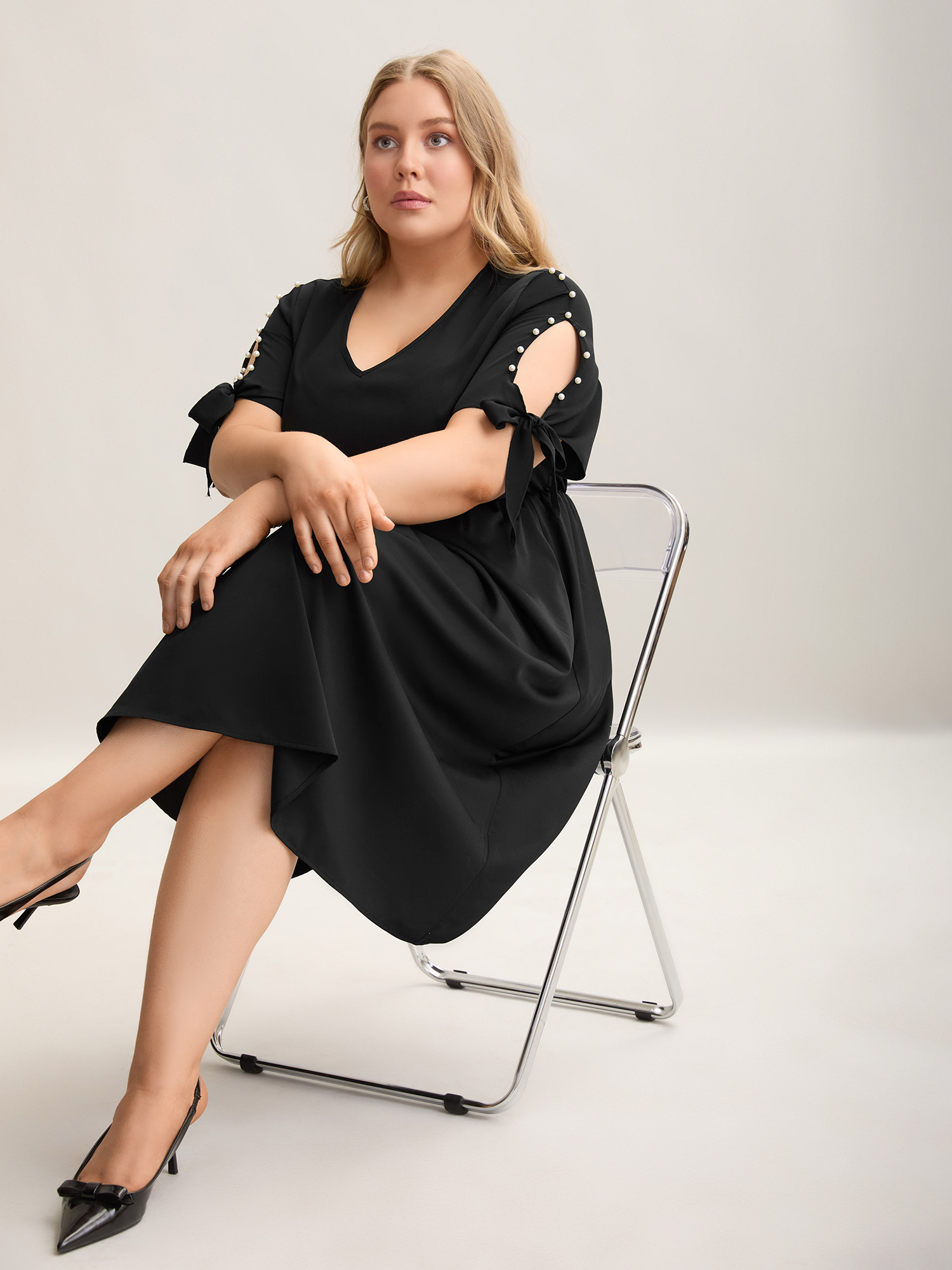 

Plus Size Cut-Out Sleeve Beaded Pockets Midi Dress Black Women At the Office Tie knot V-neck Short sleeve Curvy BloomChic