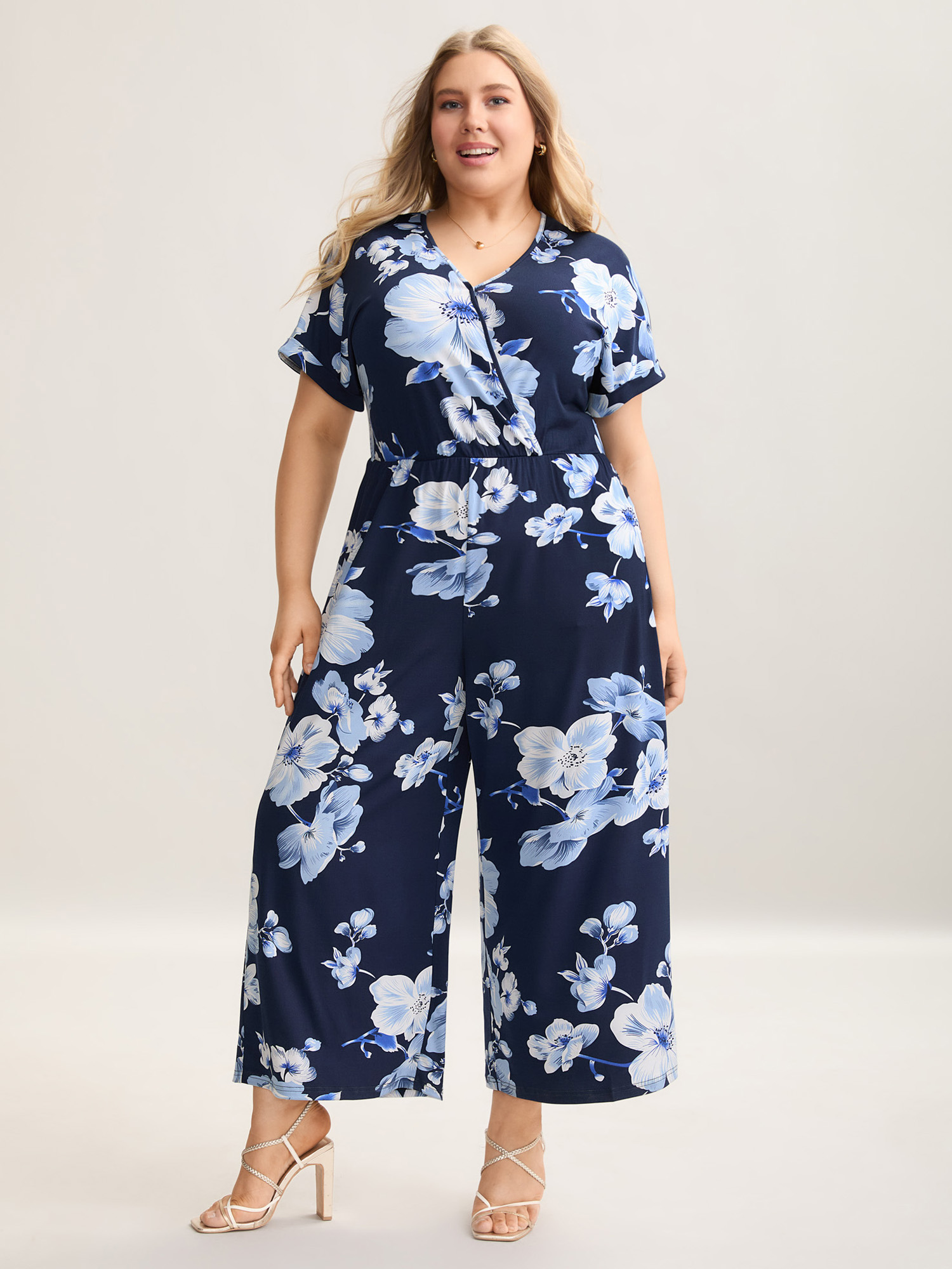 

Plus Size DarkBlue Floral Print Knit Surplice Neck Jumpsuit Women Elegant Short sleeve Overlap Collar Everyday Loose Jumpsuits BloomChic