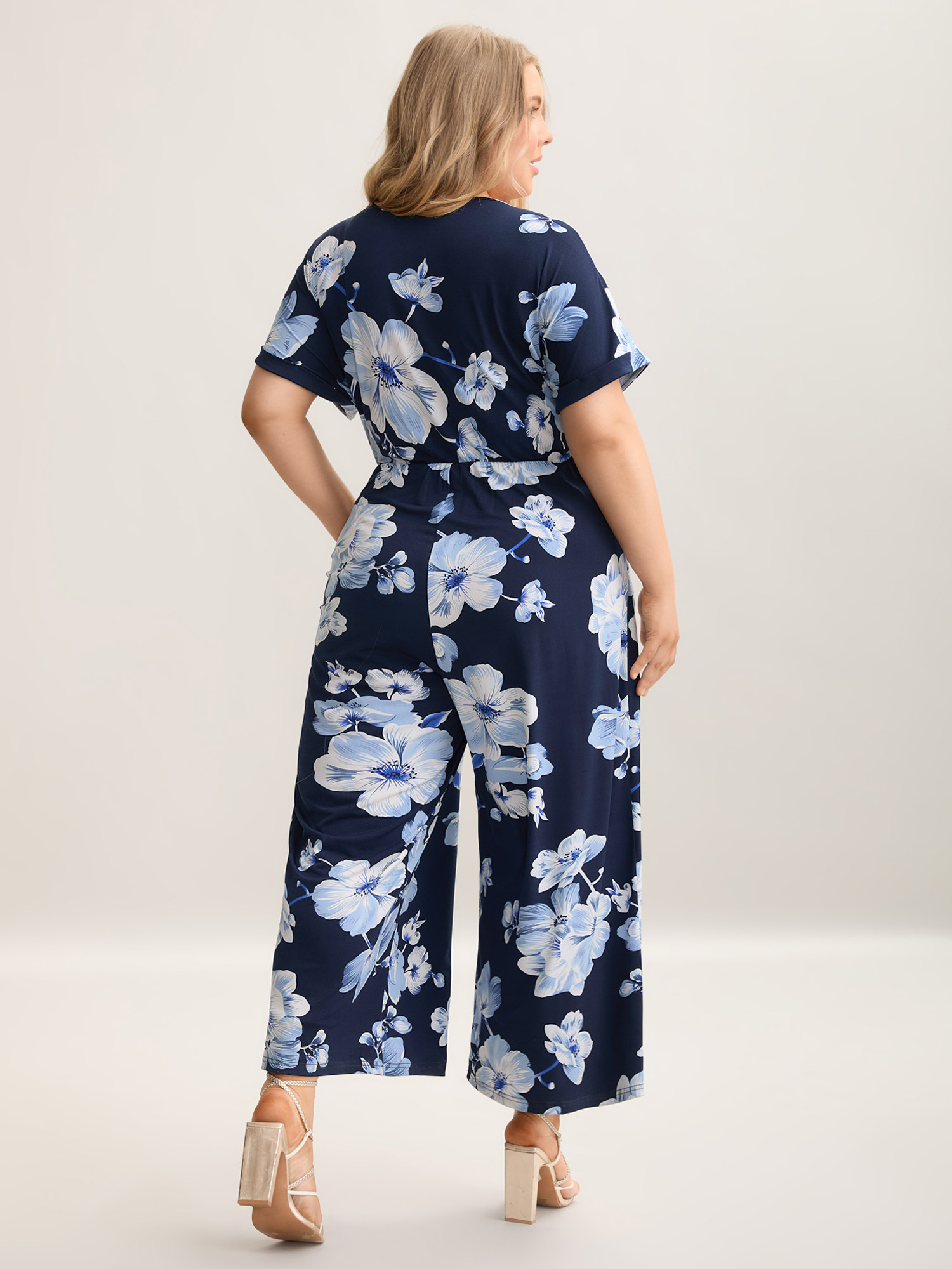 Plus Size DarkBlue Floral Print Knit Surplice Neck Jumpsuit Women Elegant Short sleeve Overlap Collar Everyday Loose Jumpsuits BloomChic 14-16/1X 