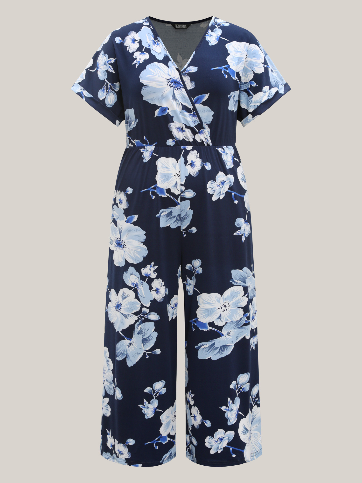 Plus Size DarkBlue Floral Print Knit Surplice Neck Jumpsuit Women Elegant Short sleeve Overlap Collar Everyday Loose Jumpsuits BloomChic 14-16/1X 