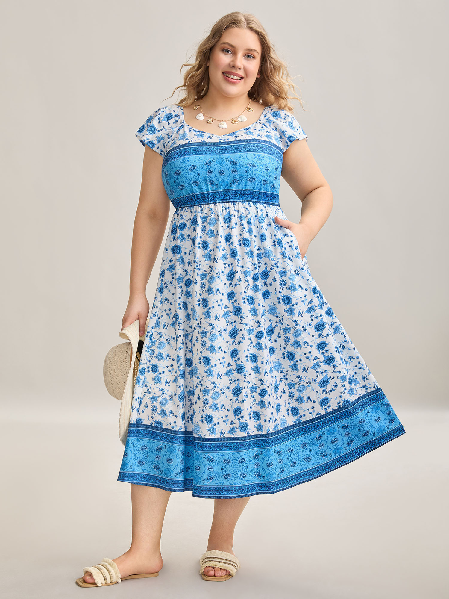 

Plus Size Contrast Floral Print Pockets Midi Dress DarkBlue Women Resort Contrast Heart neckline Cap Sleeve Curvy BloomChic