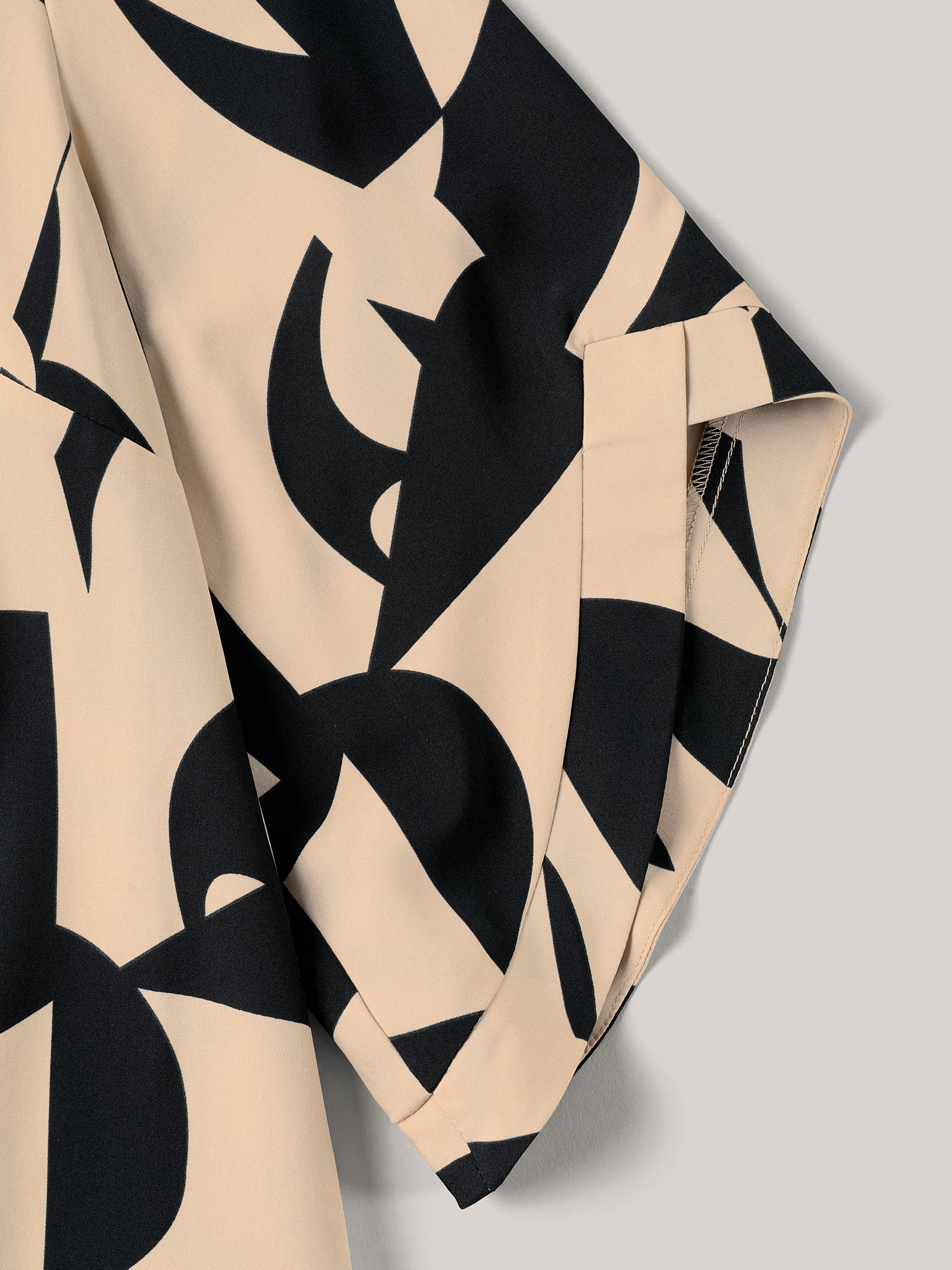 Plus Size Multicolor Geometric Pattern Tab Sleeve Flowy Blouse Women At the Office Elbow-length sleeve Round Neck Work Blouses BloomChic 28/5X 