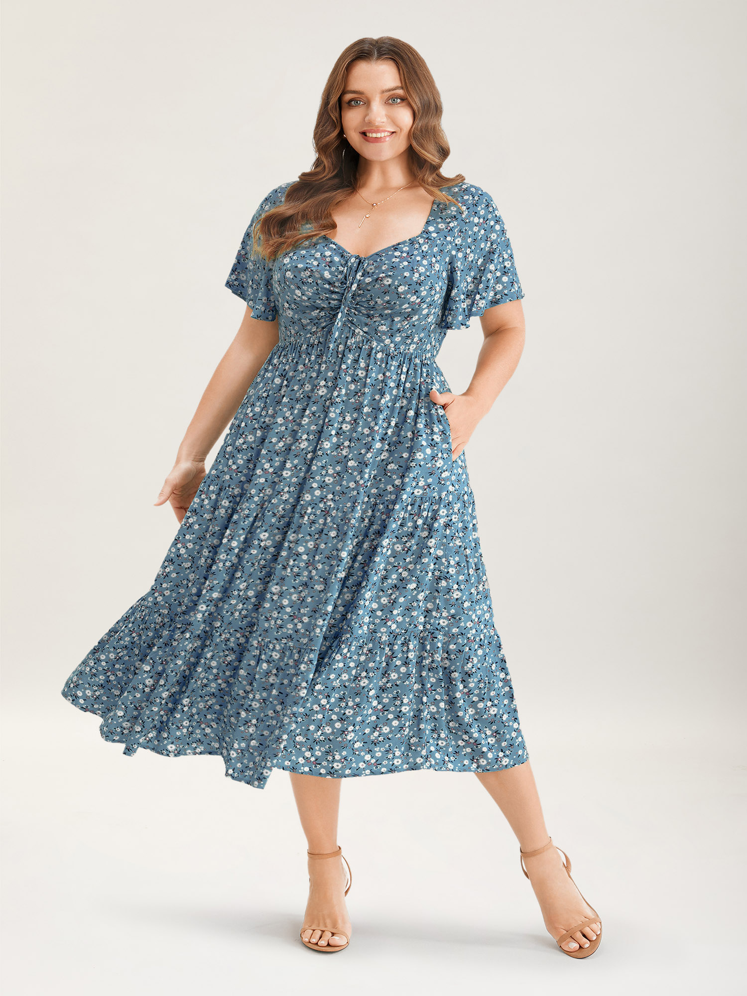 

Plus Size Ditsy Floral Drawstring Ruched Pocket Ruffle Tiered Dress Aegean Women Elegant Non V-neck Short sleeve Curvy Midi Dress BloomChic