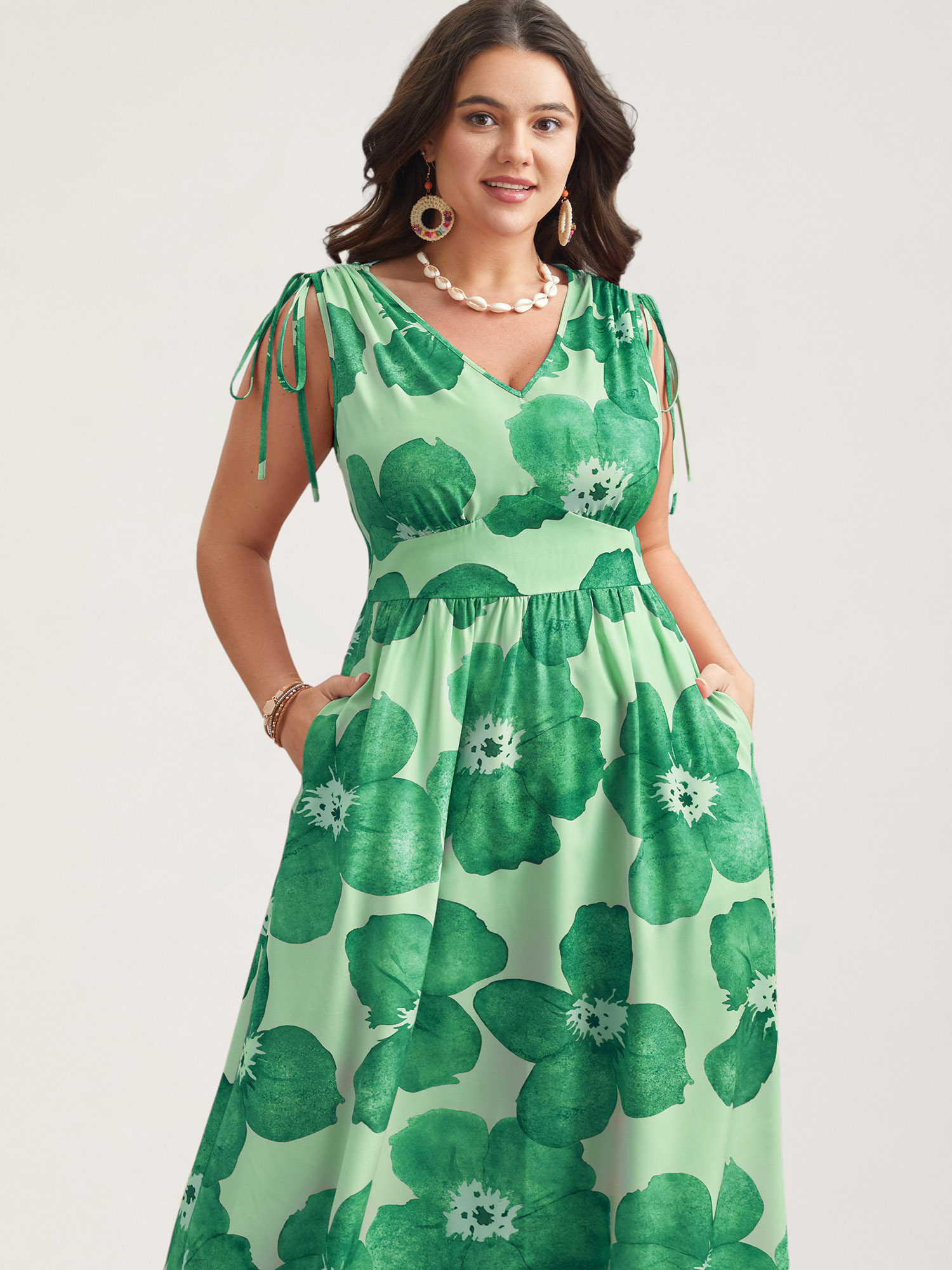 

Plus Size Floral Print V-Neck Tied Midi Dress Greenbean Women Elegant Gathered V-neck Sleeveless Curvy BloomChic