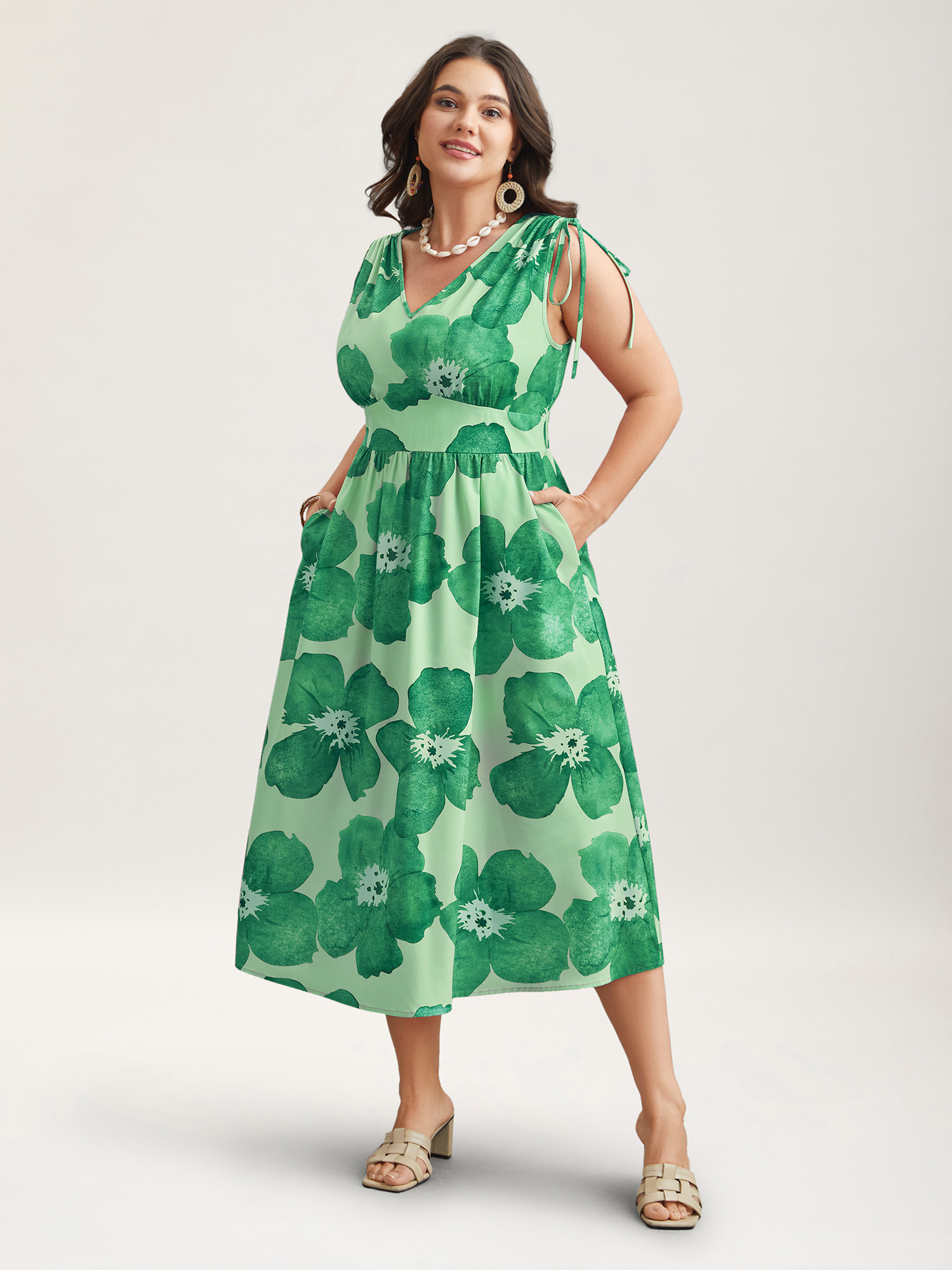 

Plus Size Floral Print V-Neck Tied Midi Dress Greenbean Women Elegant Gathered V-neck Sleeveless Curvy BloomChic