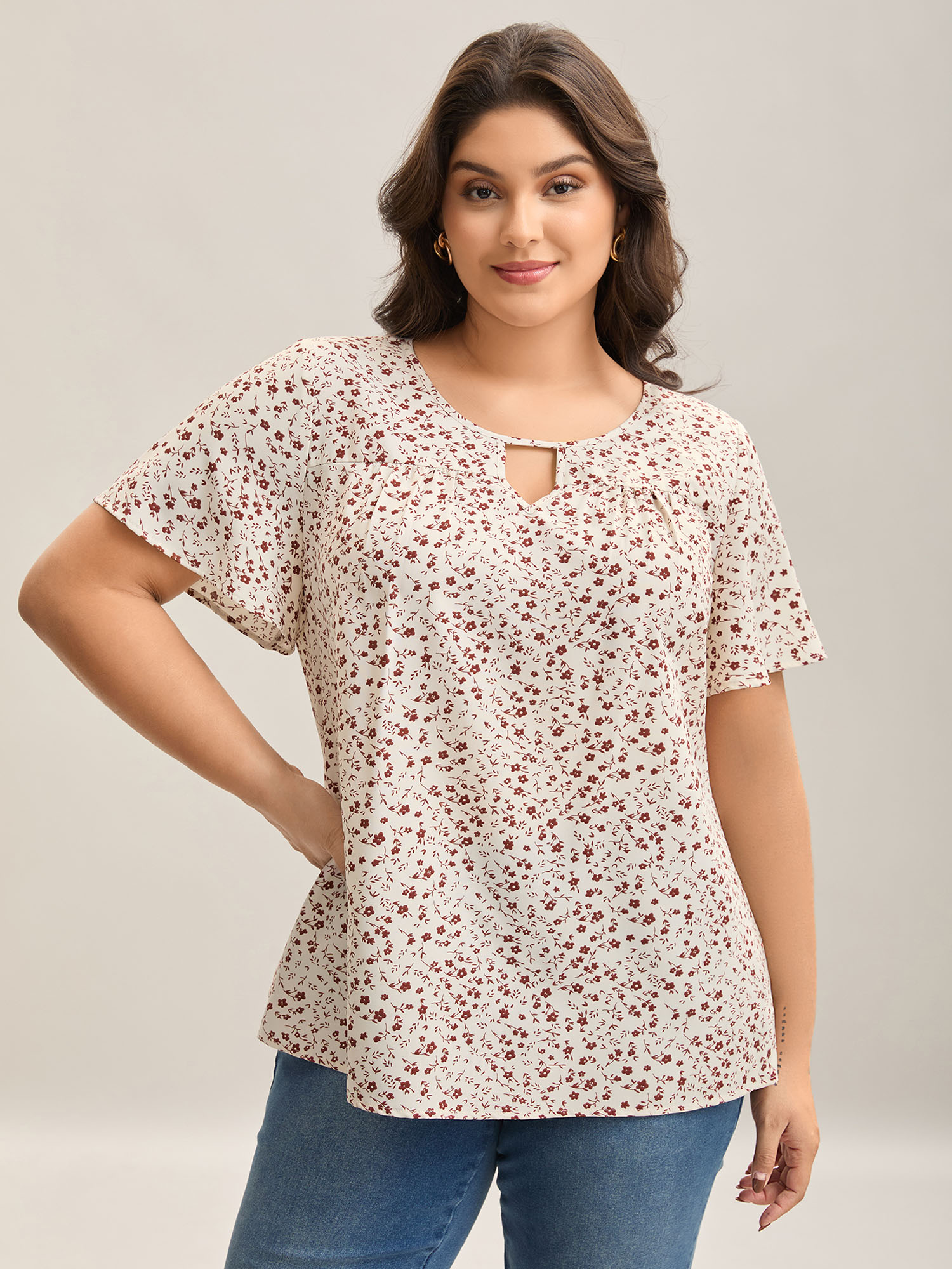 

Plus Size Beige Ditsy Floral Print Lotus Leaf Sleeve Shirt Women Elegant Short sleeve Round Neck Everyday Blouses BloomChic