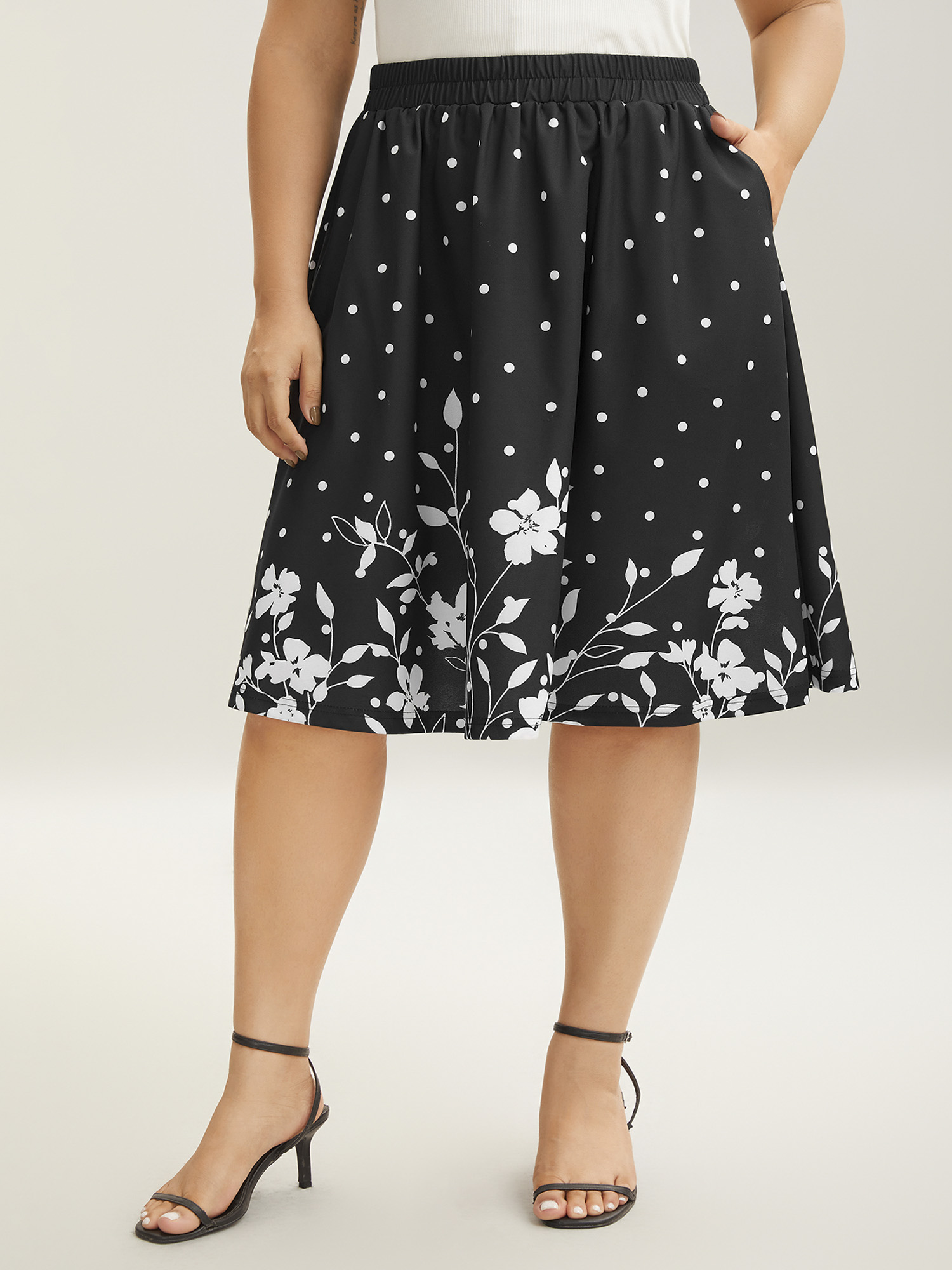 

Plus Size Floral Print Pleated Midi Skirt Women BlackFlower Elegant Bodycon Low stretch Slanted pocket Everyday-Elegant Skirts BloomChic