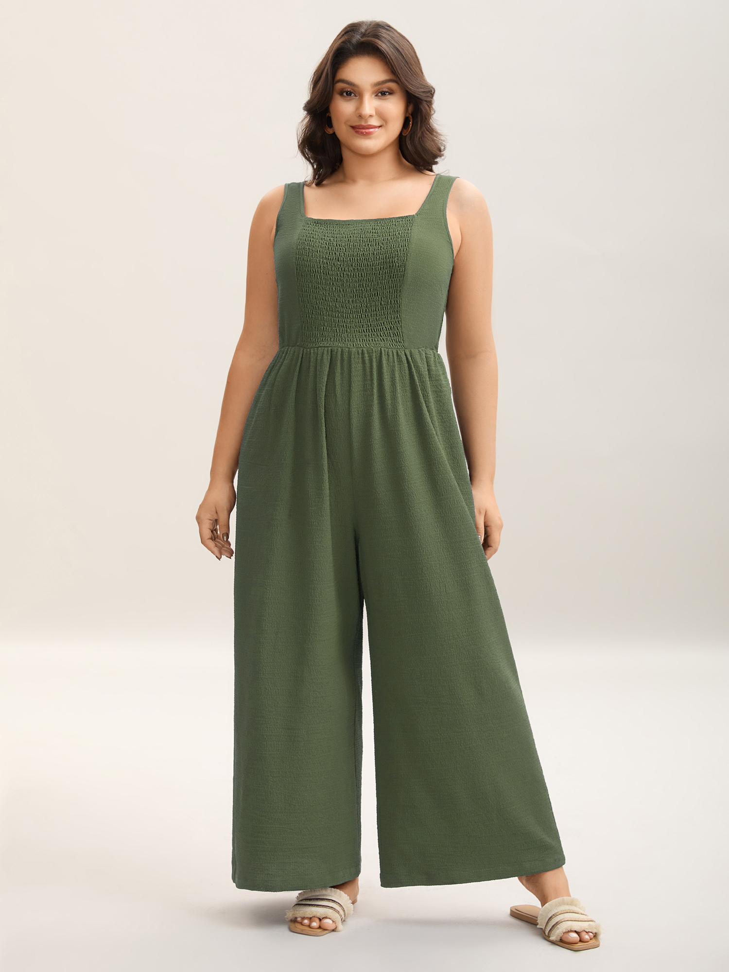 Side view of BloomChic Women's Plus Size Shirred Pockets Wide-Leg Plain Jumpsuit ArmyGreen Vacation 26/4X