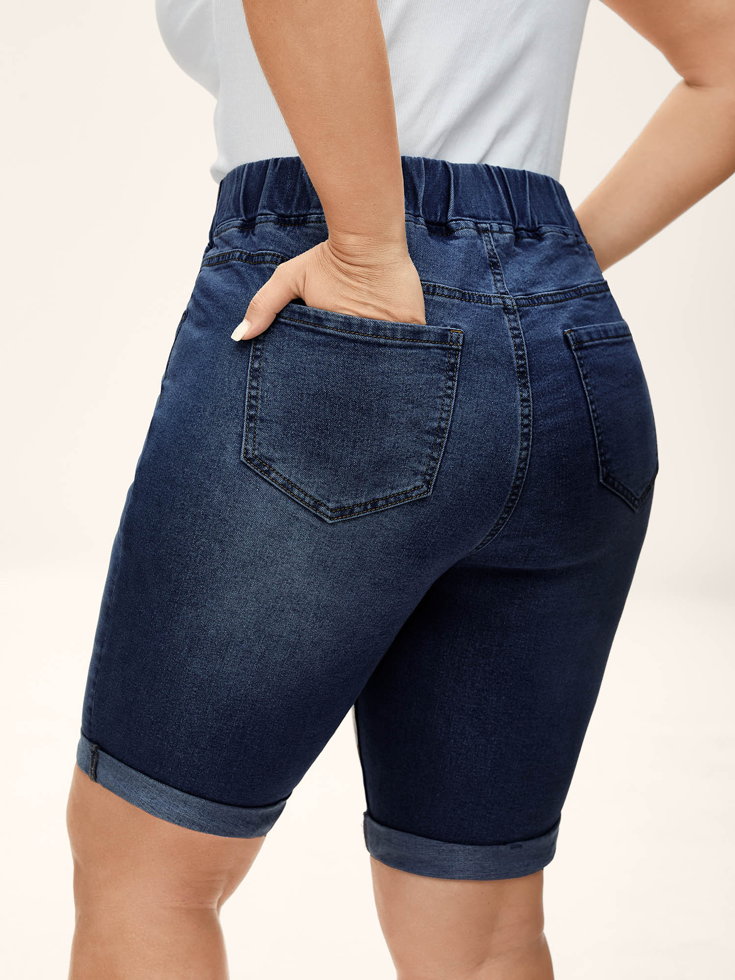 Side view of BloomChic Women's Plus Size Pull-On Stretchy Skinny-Fit Denim Shorts Darkindigo Non High Rise Medium stretch Casual 10/M