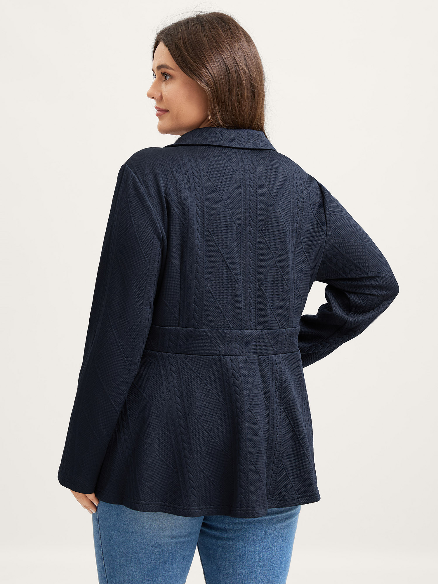 Side view of BloomChic Women's Plus Size Textured Waist-Defining Solid Blazer Indigo not graphics Cable Knit Sleeve Long Sleeve Notched Lapel 14-16/1X