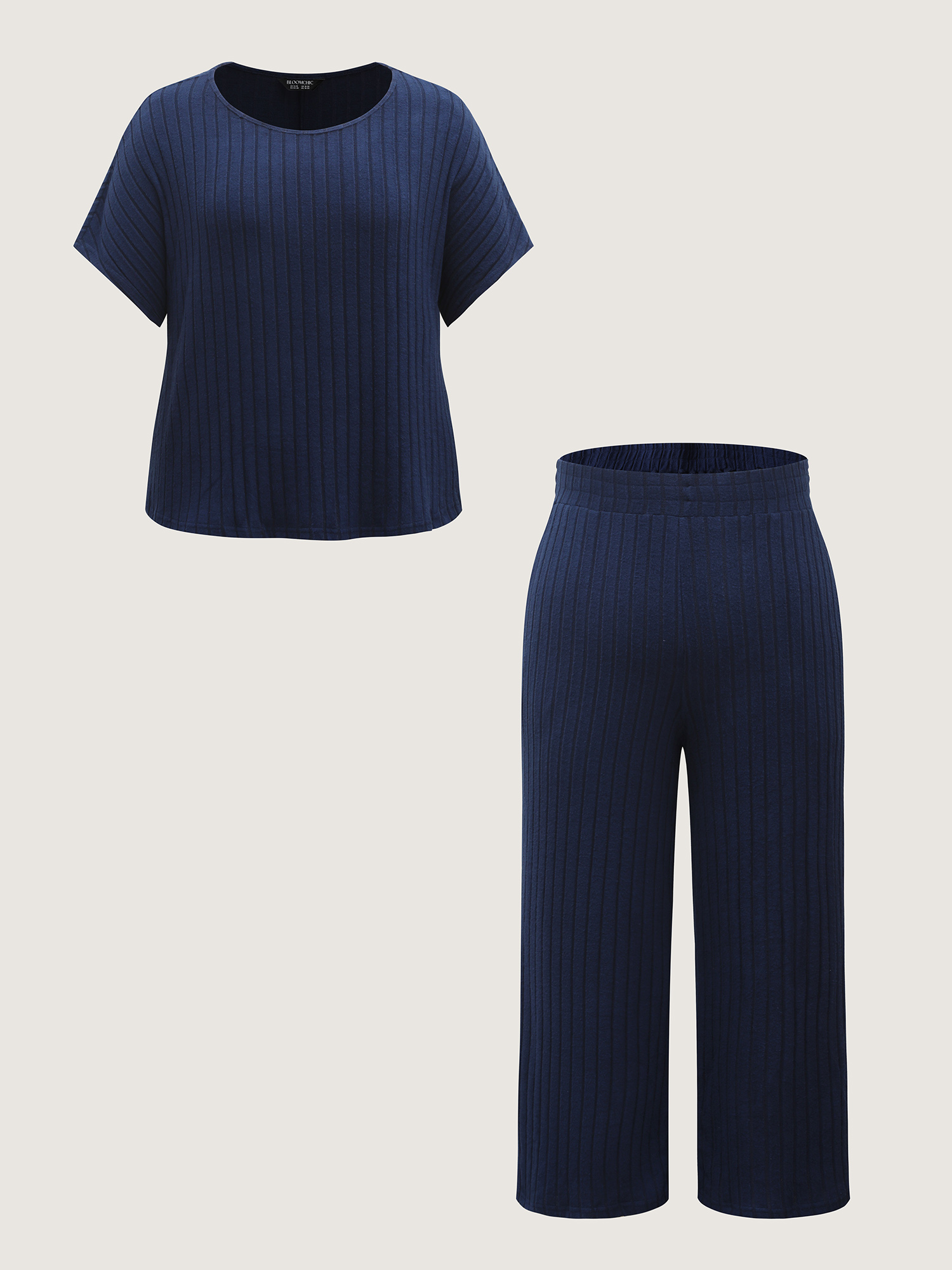 Side view of BloomChic Women's Plus Size Stretchy Pit Strip Solid Loungewear Set Midnight Solid Short sleeve Non 28/5X