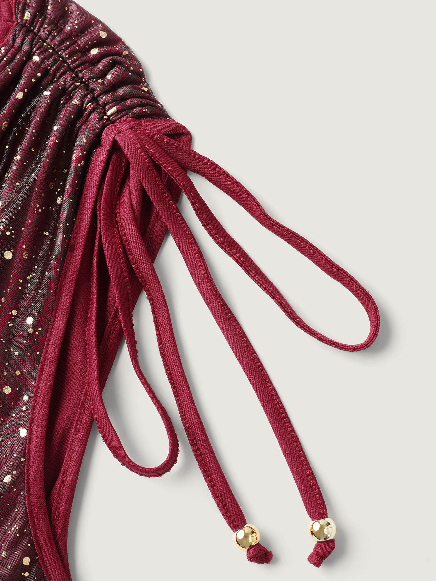 Side view of BloomChic Women's Plus Size Shimmery Sequin Rhinestones Shoulder Tie Midi Dress Burgundy Party Midi Drawstring 10/M