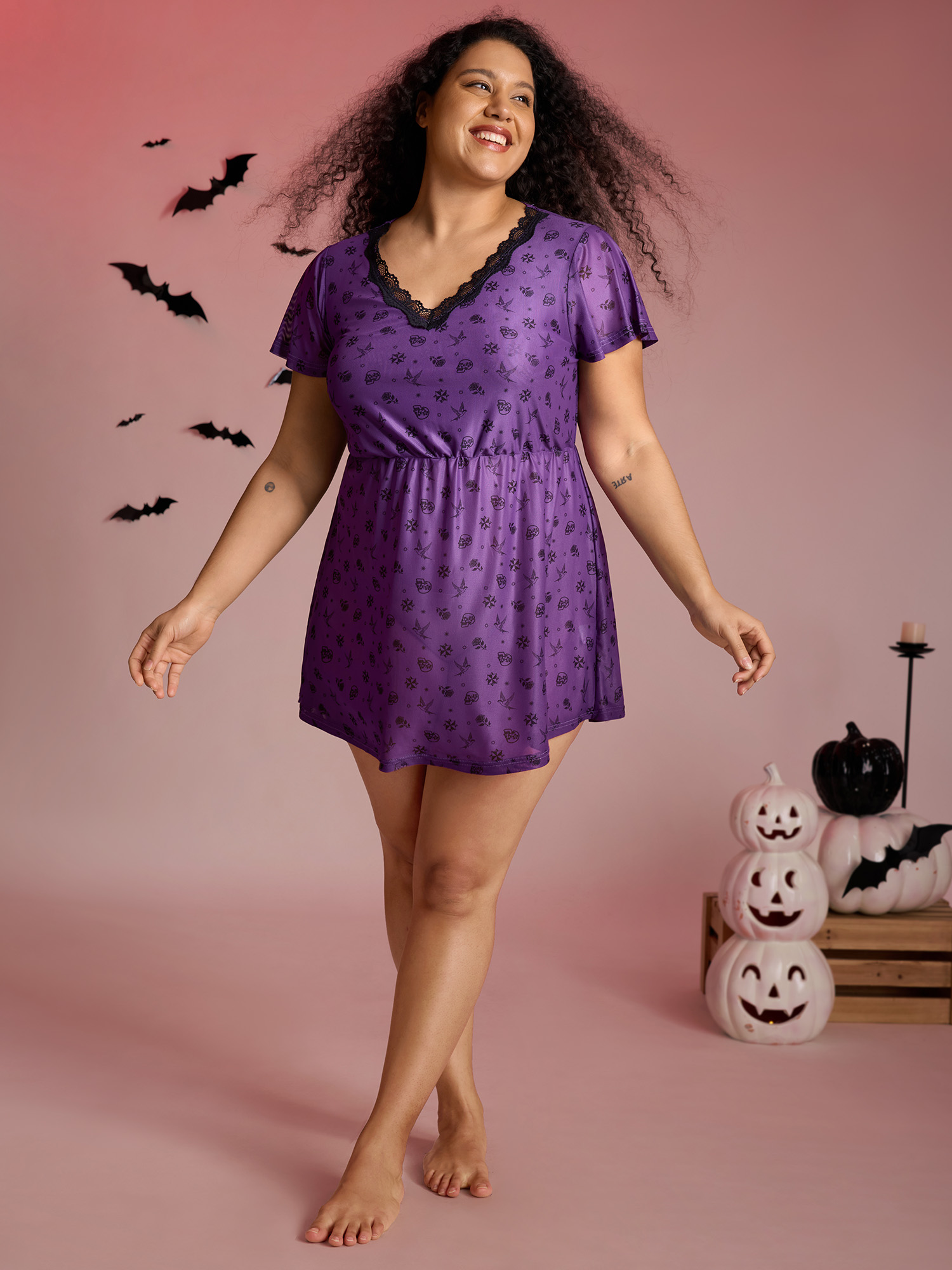 Side view of BloomChic Women's Plus Size Halloween Fun Print Stretchy Waist Nightgown Deeppurple Short sleeve Tunic 10/M