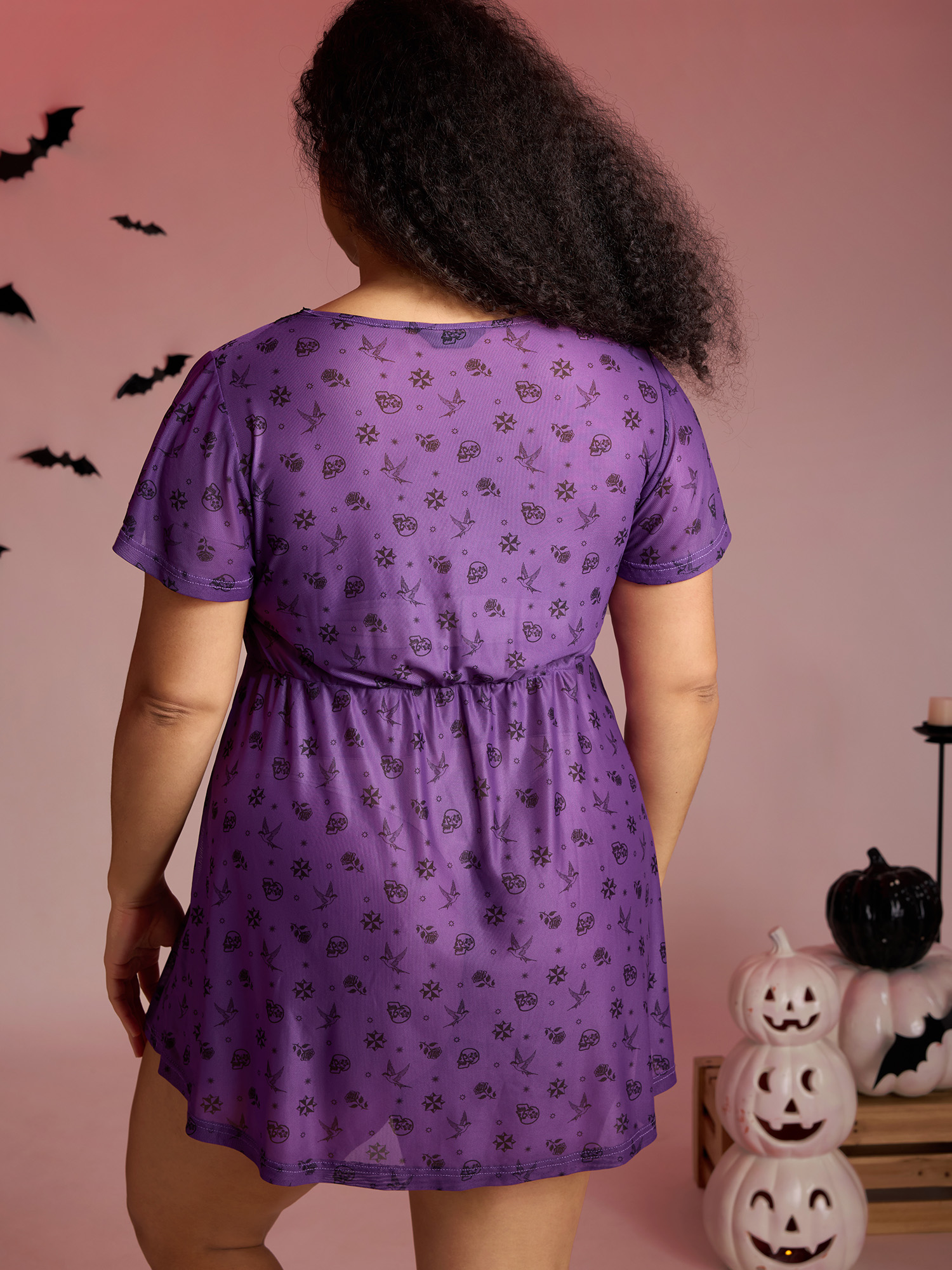Side view of BloomChic Women's Plus Size Halloween Fun Print Stretchy Waist Nightgown Deeppurple Short sleeve Tunic 10/M