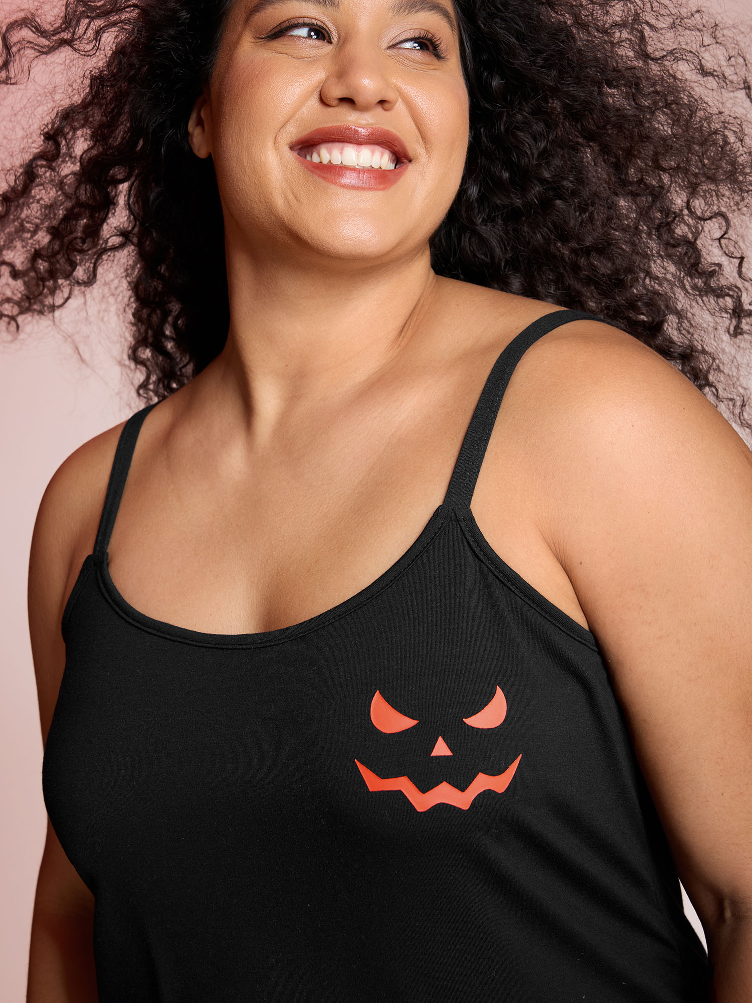 Side view of BloomChic Women's Plus Size Halloween Stretchy Plaid Contrast Pajama Set Black Graphic-Halloween 10/M