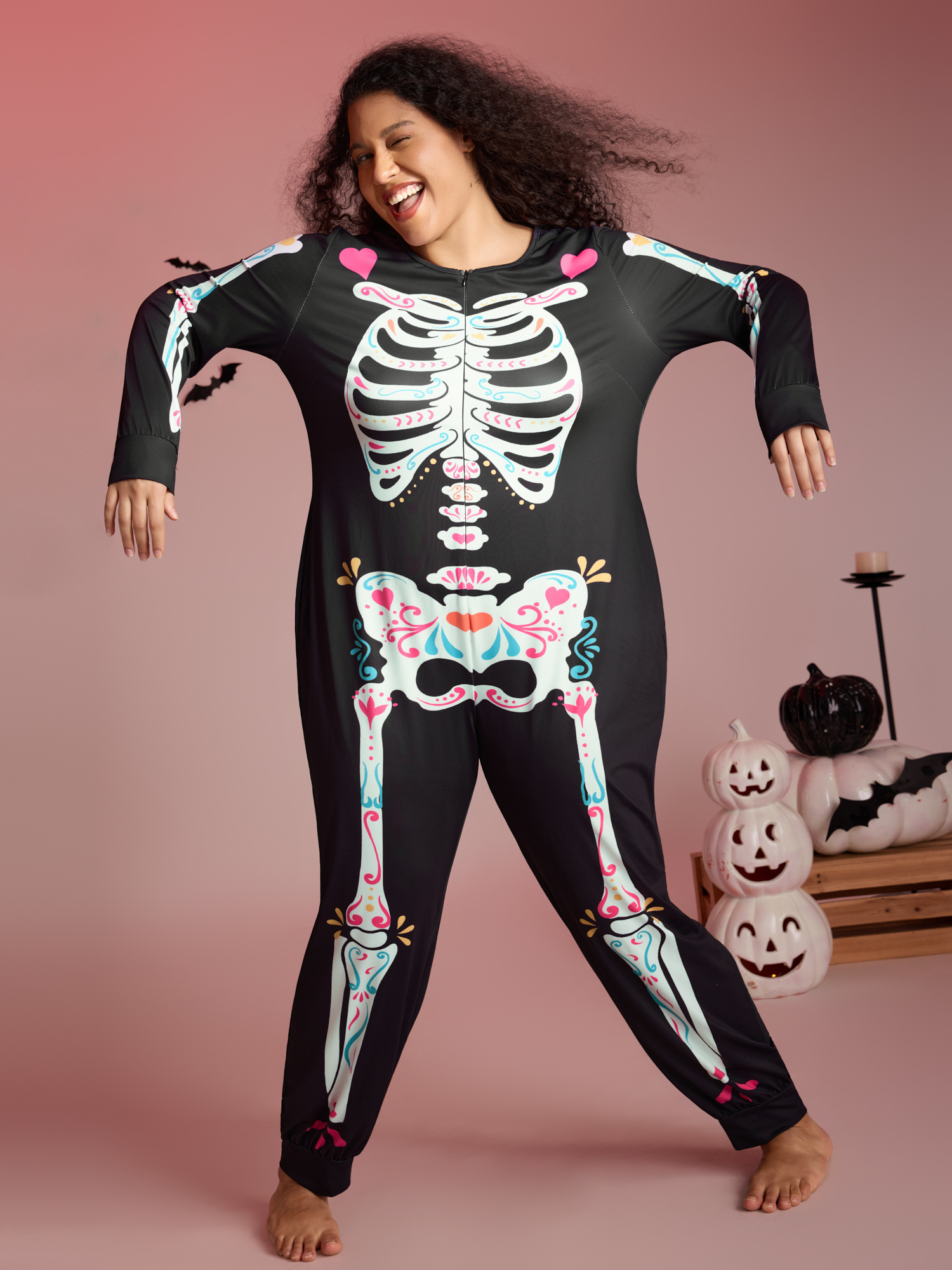 Side view of BloomChic Women's Plus Size Skeletal Rib Print Hidden Zipper Lounge Jumpsuit Black 14-16/1X