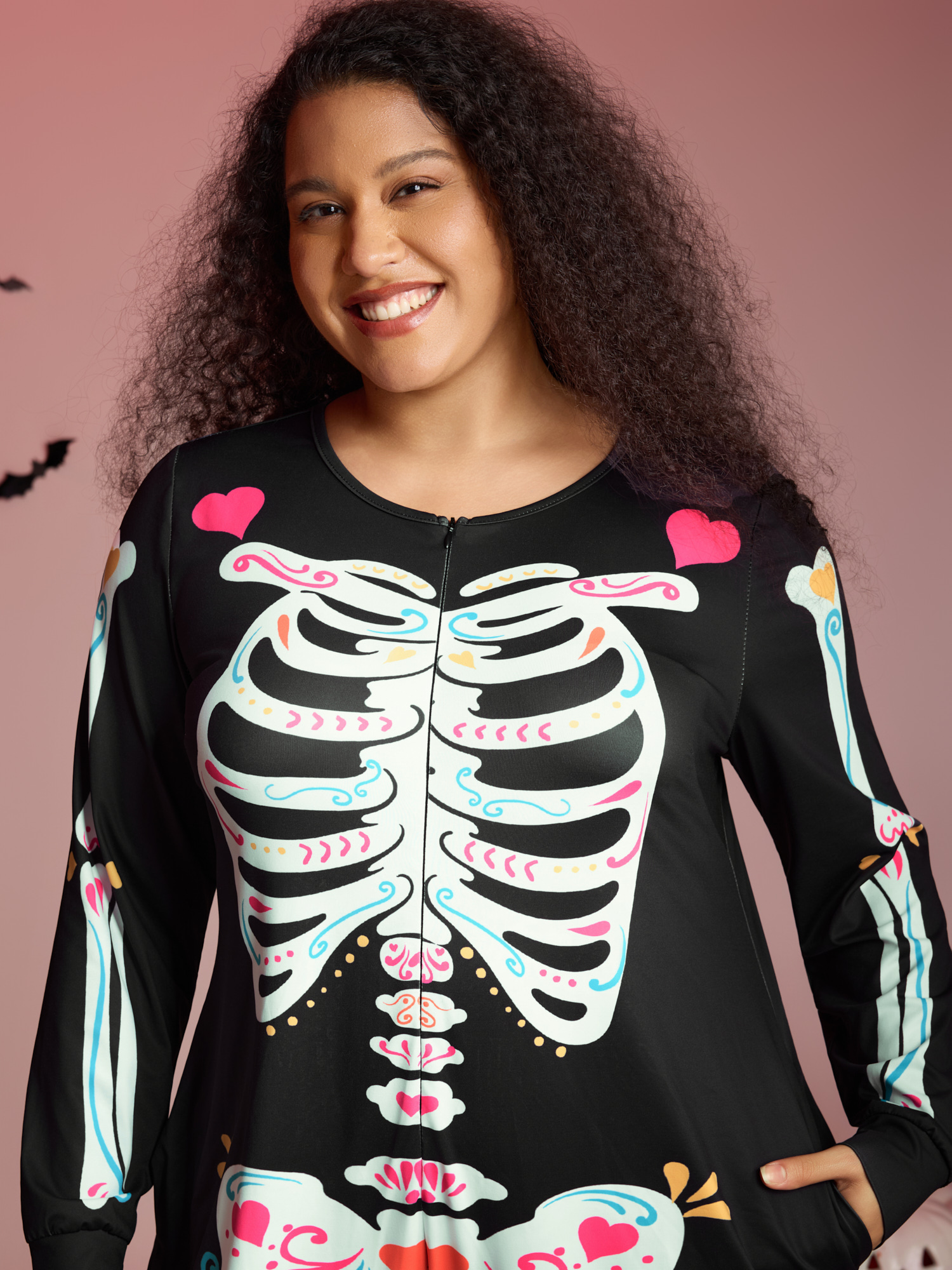 Side view of BloomChic Women's Plus Size Skeletal Rib Print Hidden Zipper Lounge Jumpsuit Black 14-16/1X