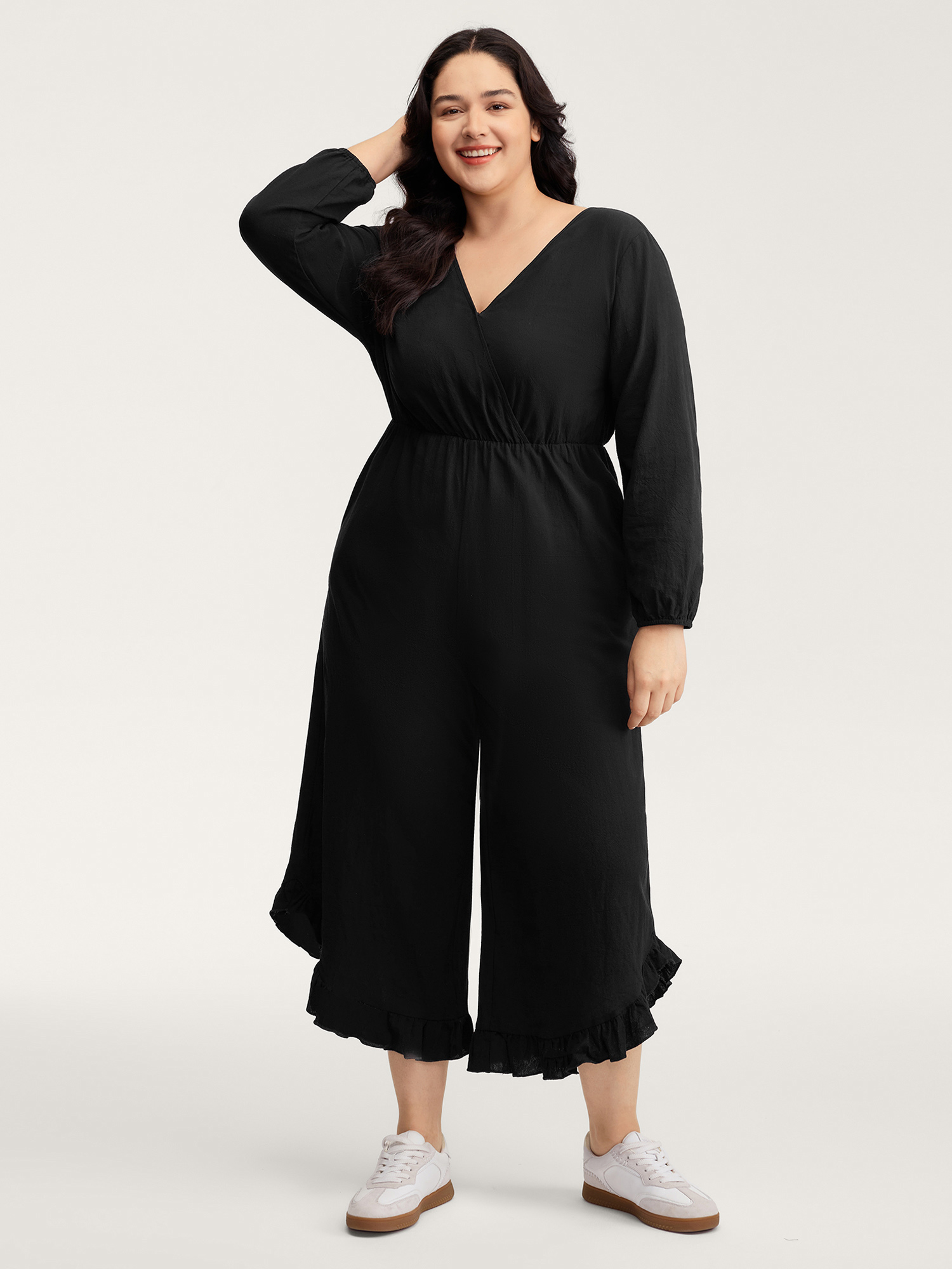Side view of BloomChic Women's Plus Size Pure Cotton Ruffled Hem Pockets Jumpsuit Black Casual 30/6X