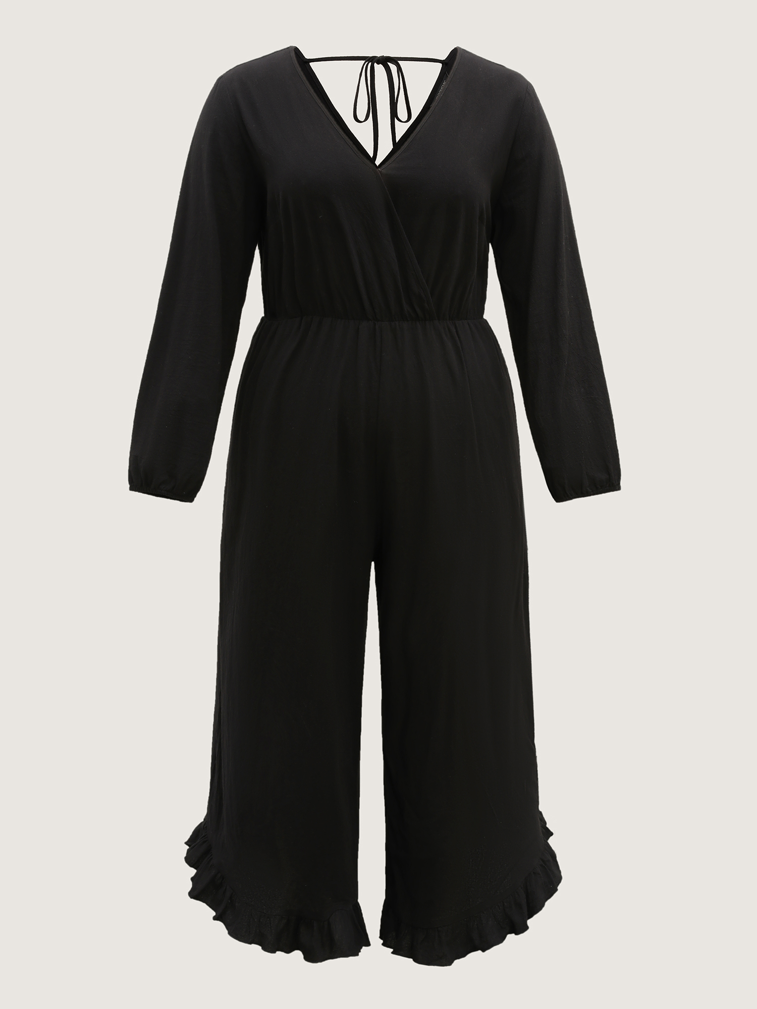 Side view of BloomChic Women's Plus Size Pure Cotton Ruffled Hem Pockets Jumpsuit Black Casual 30/6X