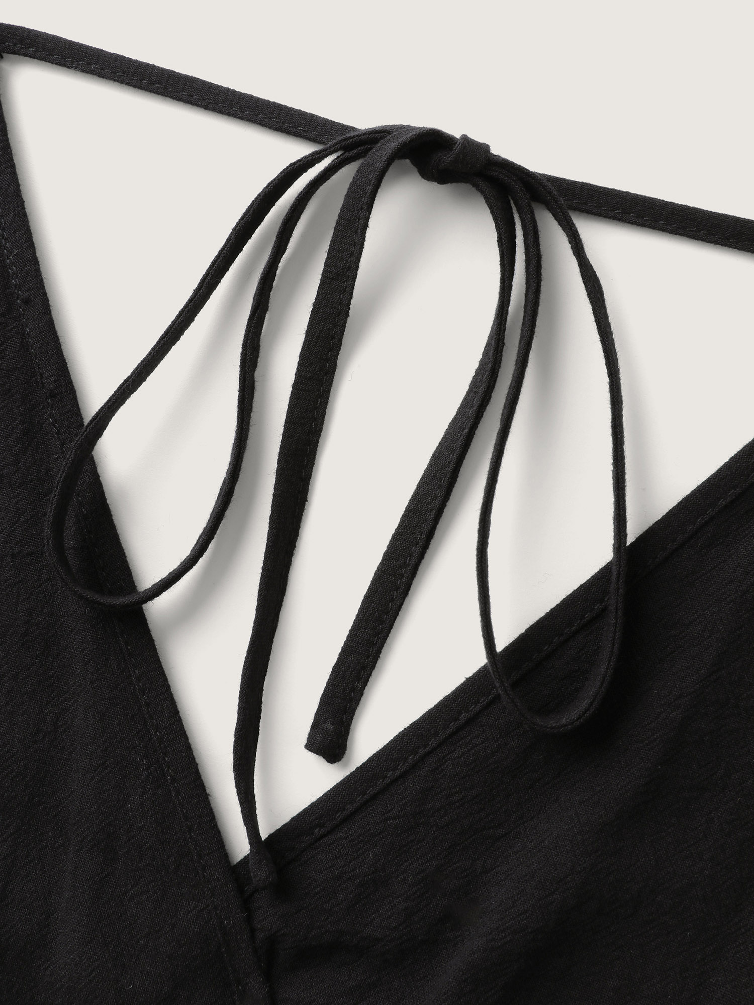 Side view of BloomChic Women's Plus Size Pure Cotton Ruffled Hem Pockets Jumpsuit Black Casual 30/6X