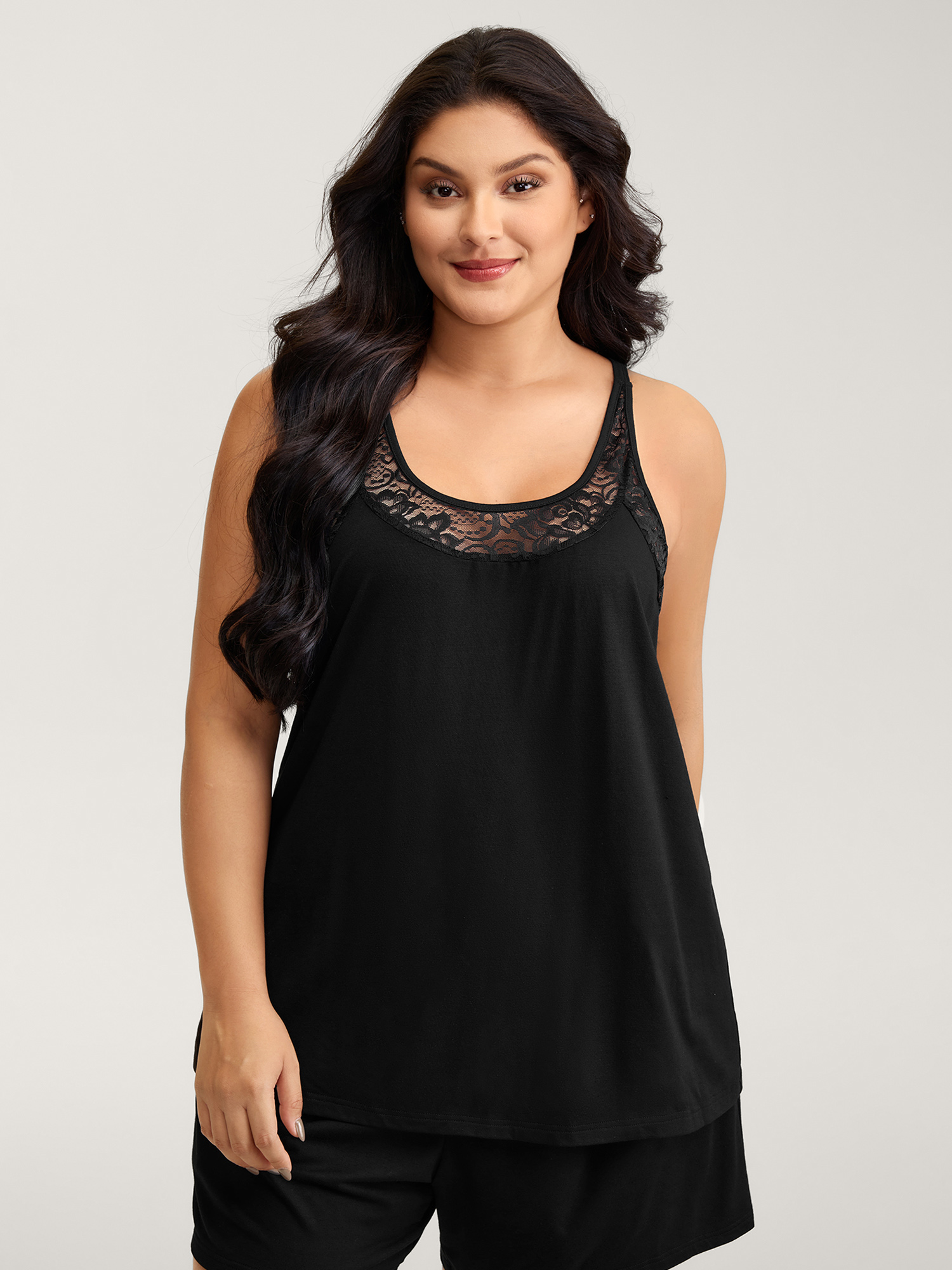 Side view of BloomChic Women's Plus Size Lace Scoop Neckline Pockets Two-Piece Pajama Set Black 18-20/2X