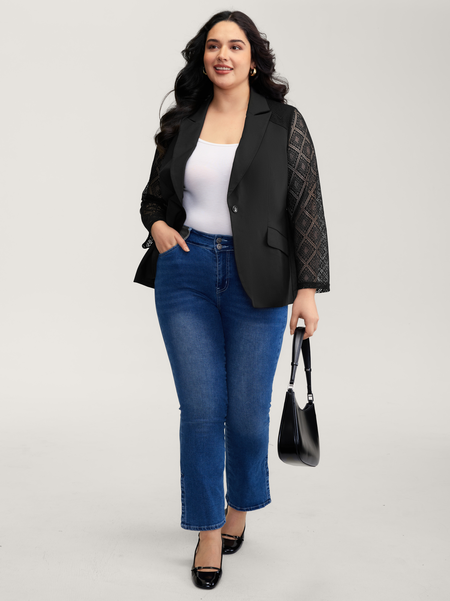 Side view of BloomChic Women's Plus Size Stretchy Textured Sheer Sleeve Contrast Blazer Black See through Sleeve Extra Long Sleeve 22-24/3X