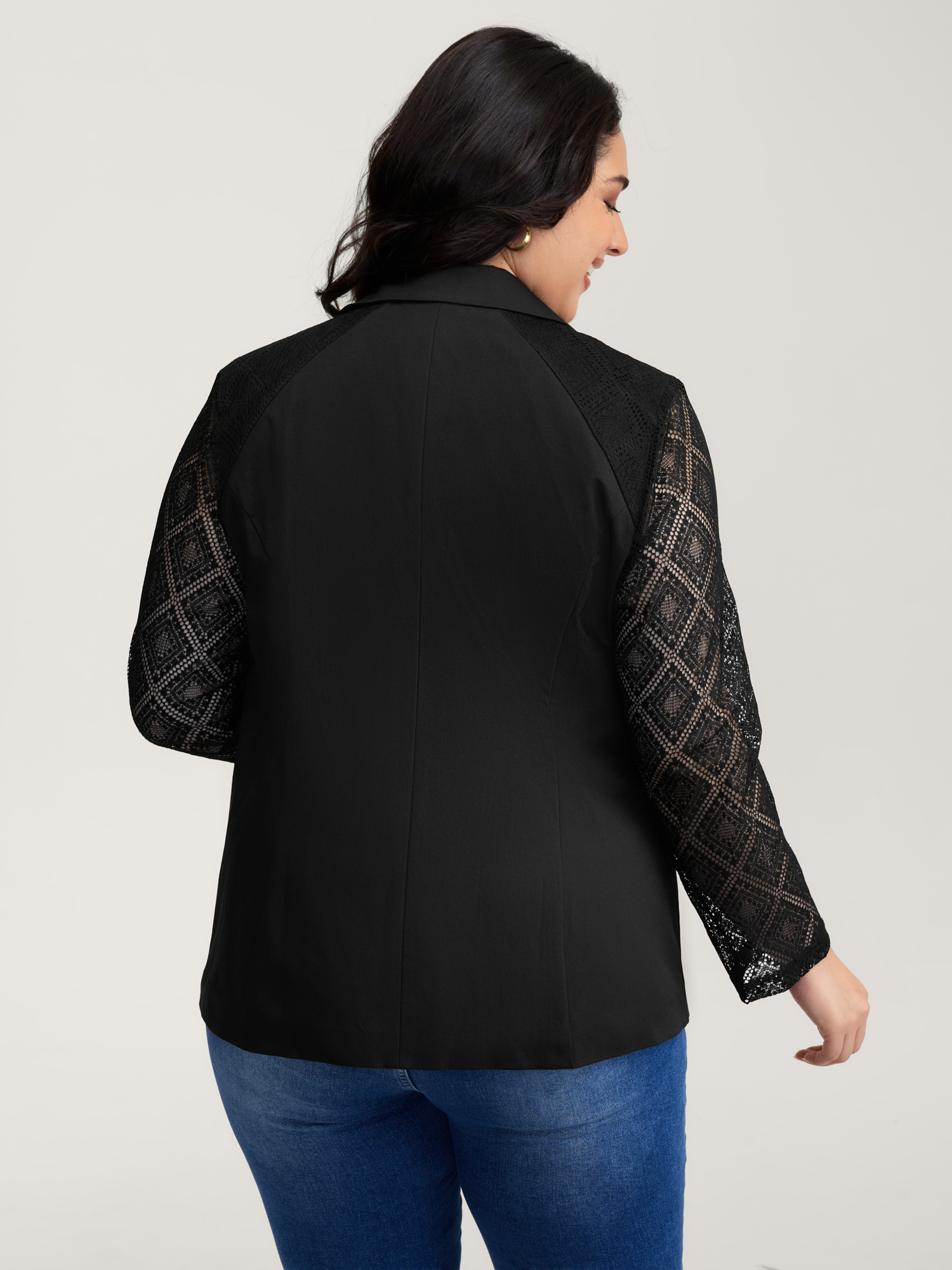 Side view of BloomChic Women's Plus Size Stretchy Textured Sheer Sleeve Contrast Blazer Black See through Sleeve Extra Long Sleeve 22-24/3X