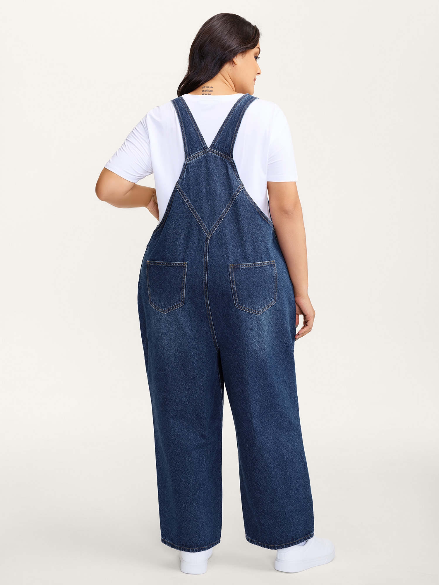 Side view of BloomChic Women's Plus Size Cotton Relaxed-Fit Side Button Overall Denim Jumpsuit Midblue not graphics Casual Non No stretch 22/3X