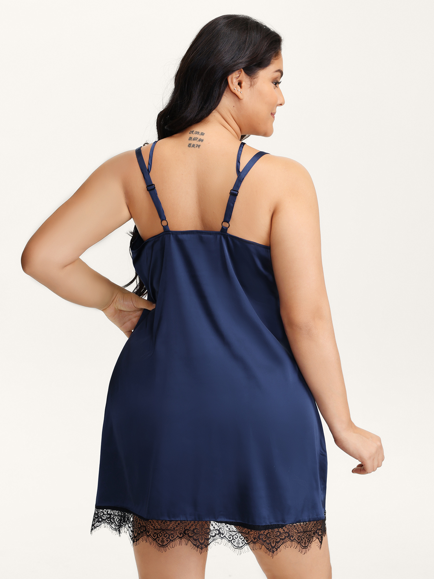 Side view of BloomChic Women's Plus Size Satin Cut-Out Lace Deep Neckline Nightgown Navy Sleeveless Mini Deep V-Neck 12/L
