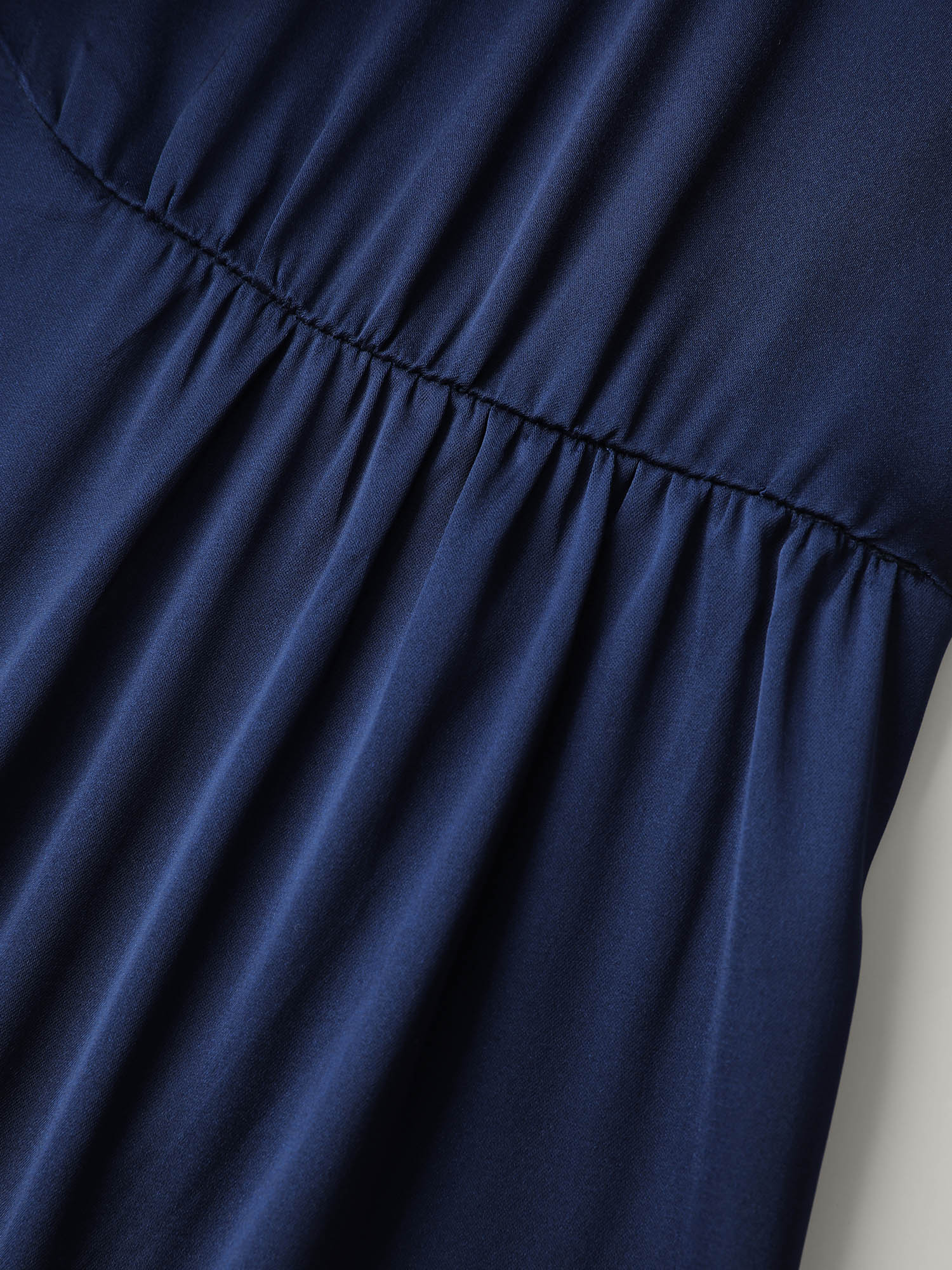 Side view of BloomChic Women's Plus Size Satin Cut-Out Lace Deep Neckline Nightgown Navy Sleeveless Mini Deep V-Neck 12/L