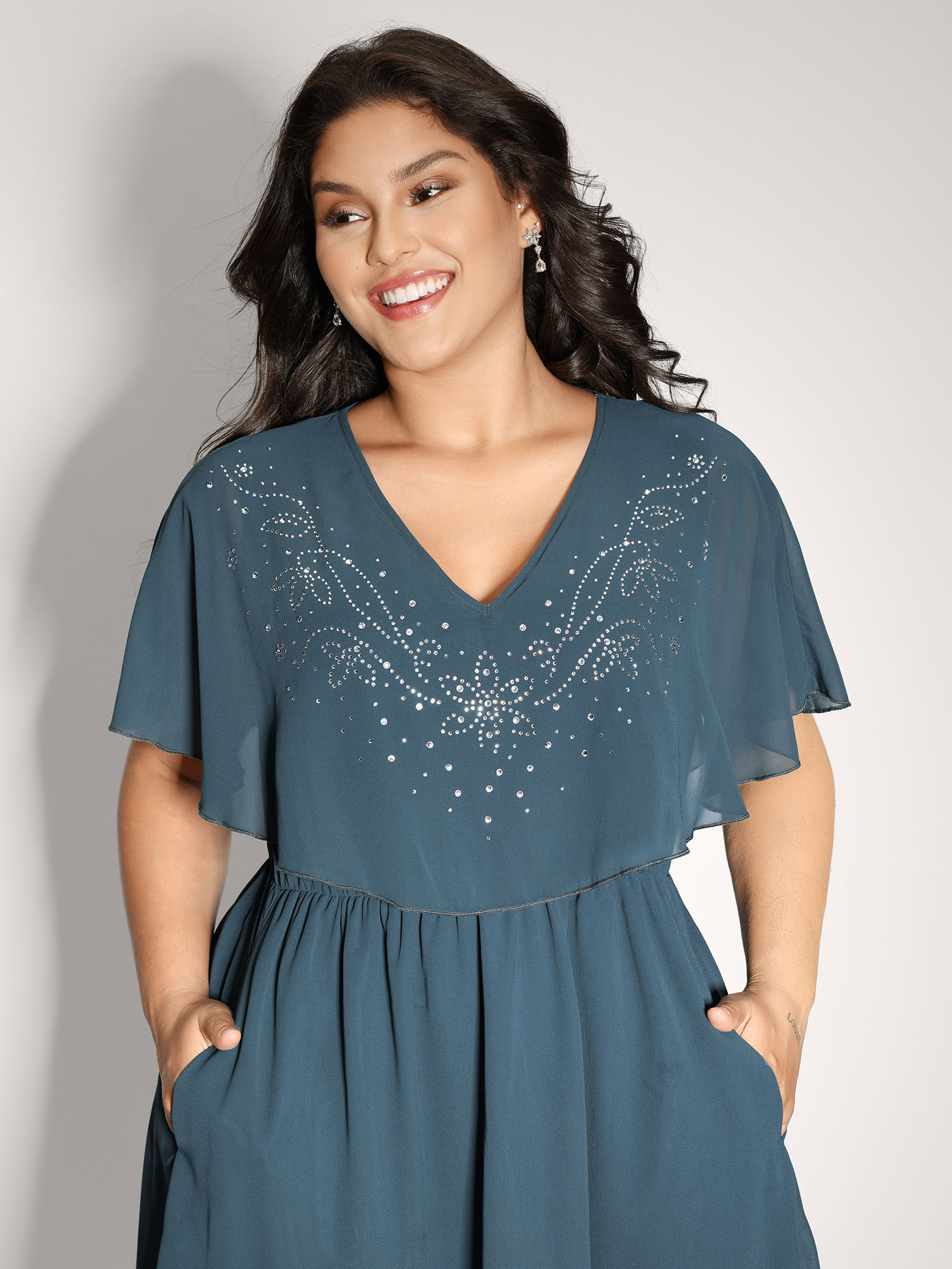 Side view of BloomChic Women's Plus Size Shimmery Hotfix Rhinestone Layered Midi Dress Aegean Party Midi Rhinestone detailing 30/6X