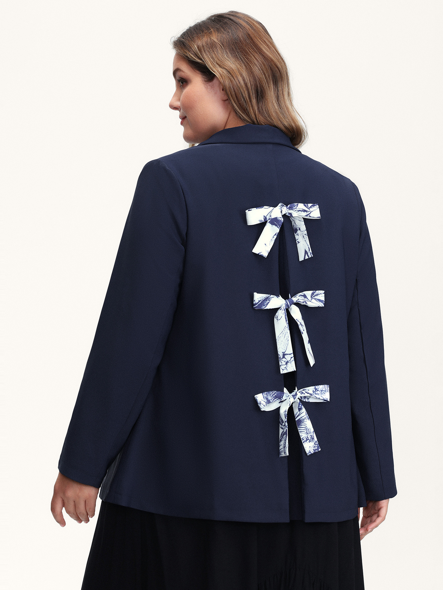 Side view of BloomChic Women's Plus Size Bowknot Back Split Hem Contrast Blazer DarkBlue Tie knot Sleeve Extra Long Sleeve 26/4X