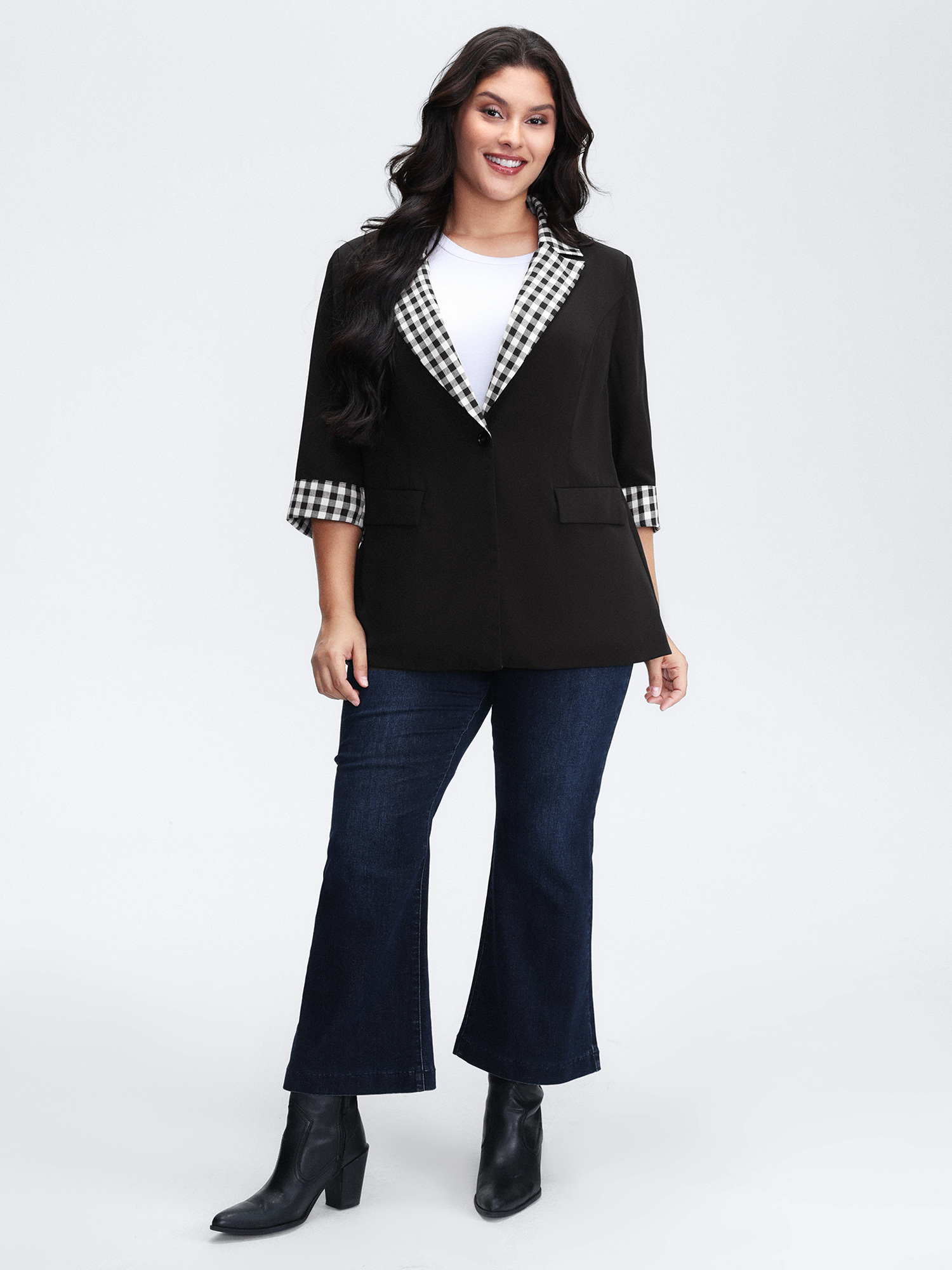 Side view of BloomChic Women's Plus Size Checkered Contrast Button Blazer Black Colorblock Sleeve 3/4 Sleeve 26/4X