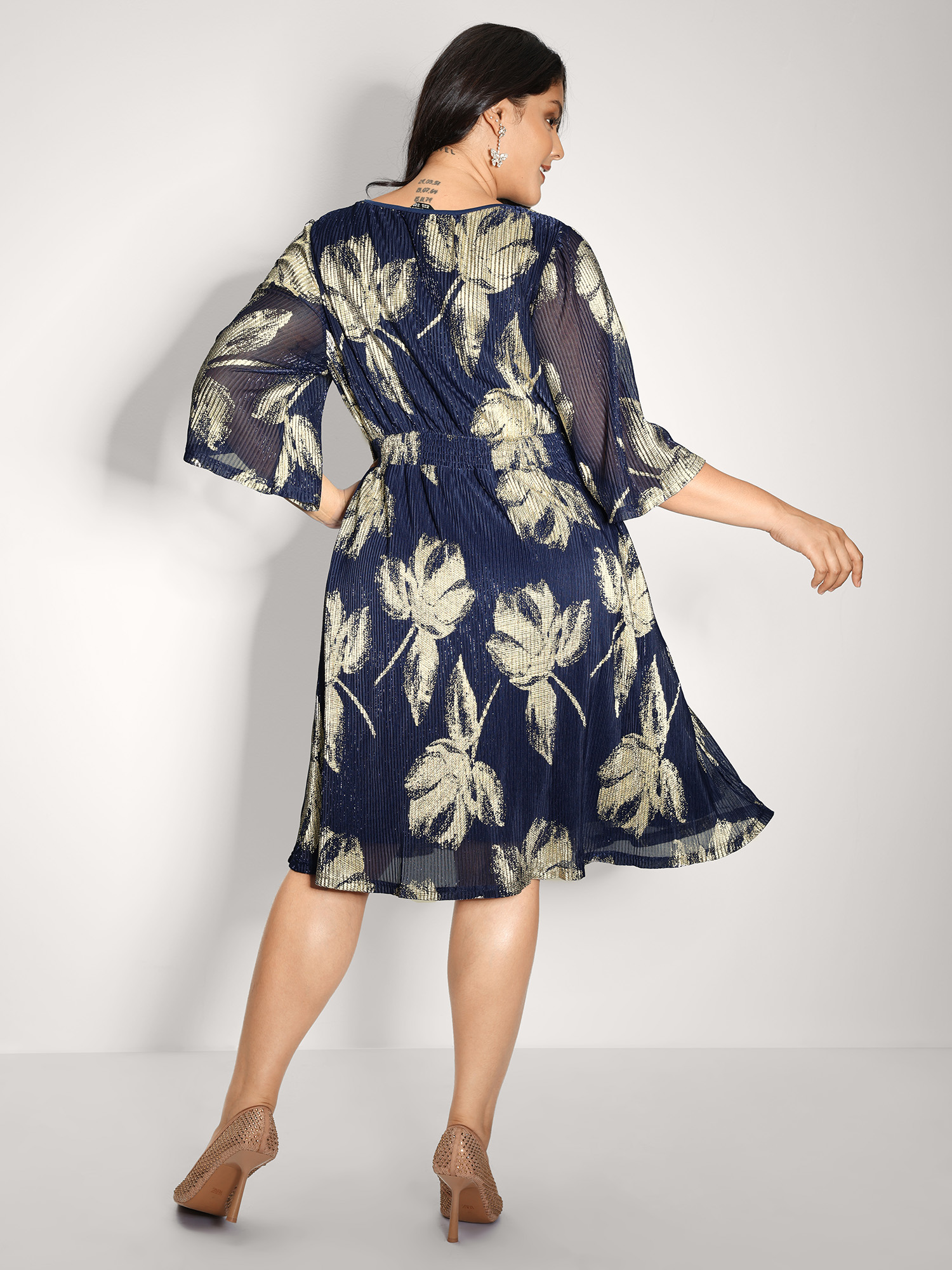 Side view of BloomChic Women's Plus Size Hot Stamped Fall Leaf Shirred Mini Dress DarkBlue Party Knee 14-16/1X