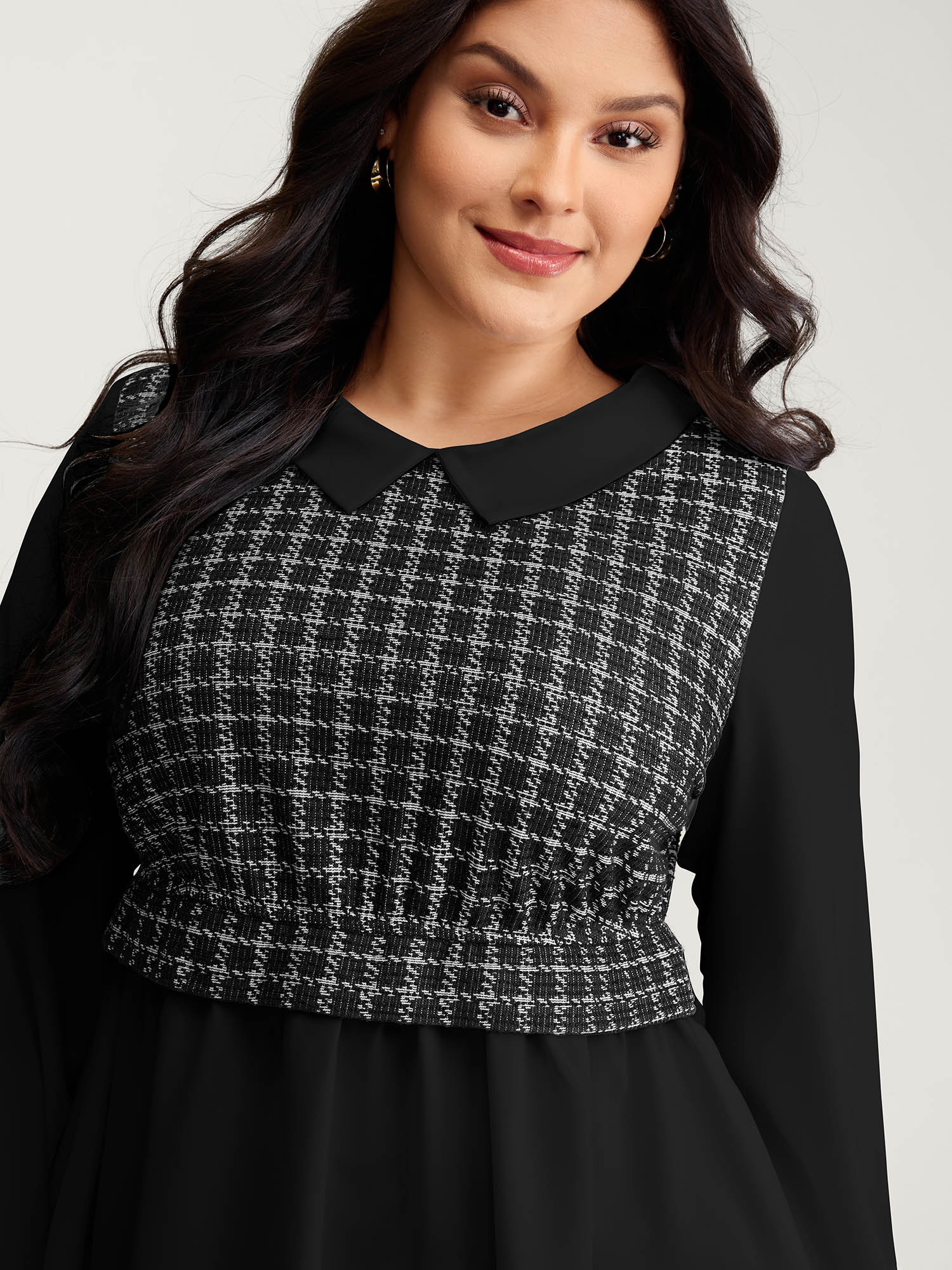 Side view of BloomChic Women's Plus Size Houndstooth Pattern Color Contrast Blouse Black Plaid Elegant Long Sleeve Peter Pan Collar 10/M