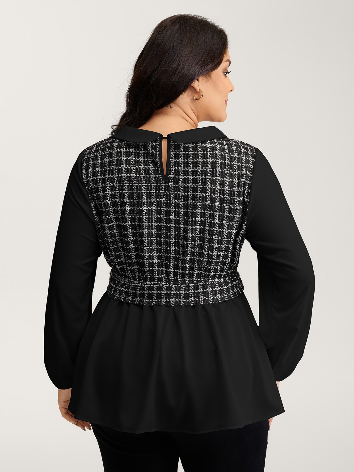 Side view of BloomChic Women's Plus Size Houndstooth Pattern Color Contrast Blouse Black Plaid Elegant Long Sleeve Peter Pan Collar 10/M