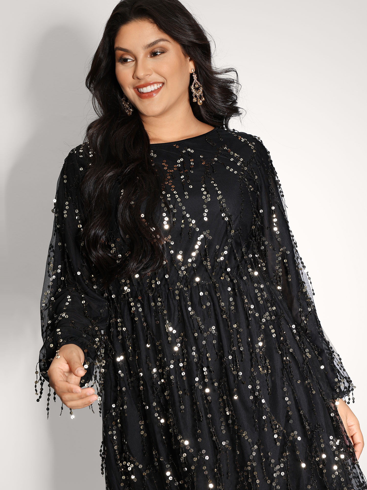 Side view of BloomChic Women's Plus Size Back Bow Tie Fringe Sequin Mini Dress Black Party Midi Ruched Round Neck 12/L