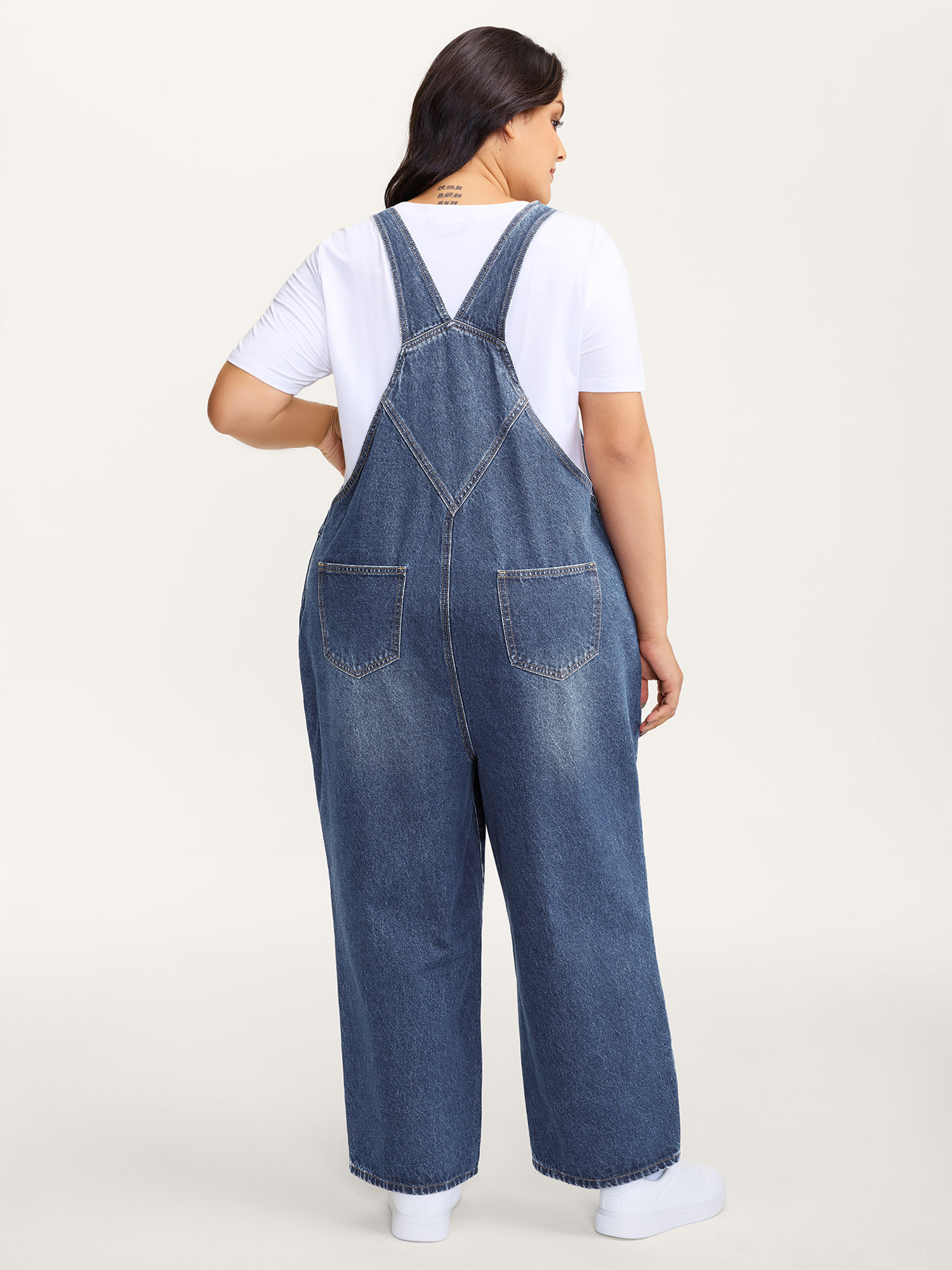 Side view of BloomChic Women's Plus Size Cotton Relaxed-Fit Side Button Overall Denim Jumpsuit Denimlightblue not graphics Casual Non No stretch 18/2X