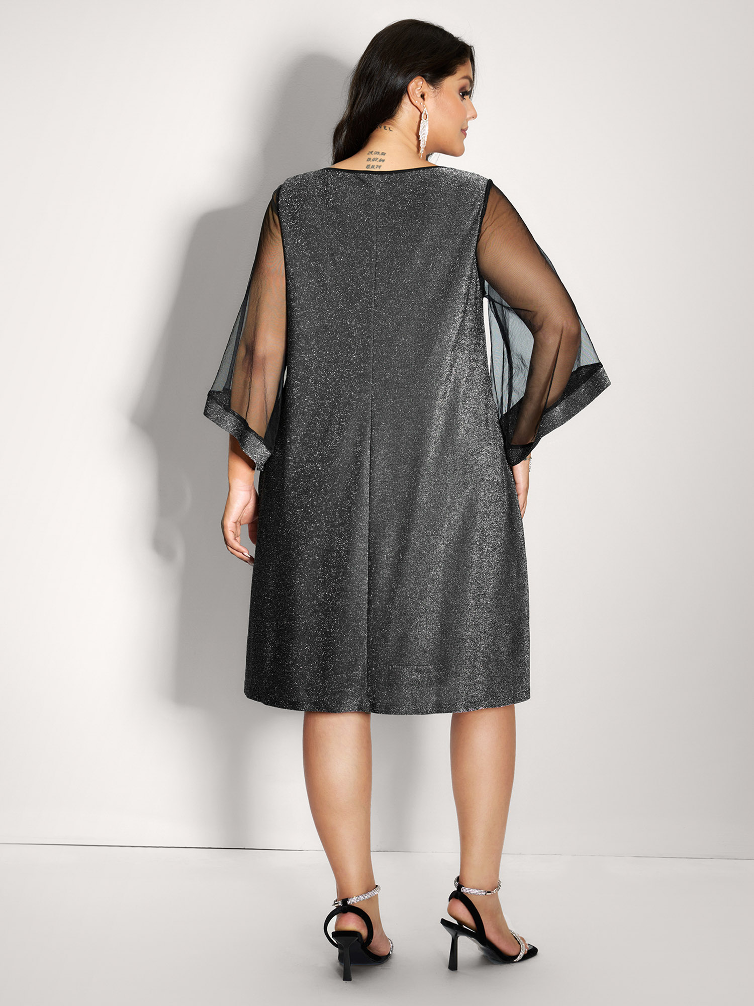 Side view of BloomChic Women's Plus Size Lurex Pockets Lined Sheer Sleeve Midi Dress Silver Party Short 14-16/1X