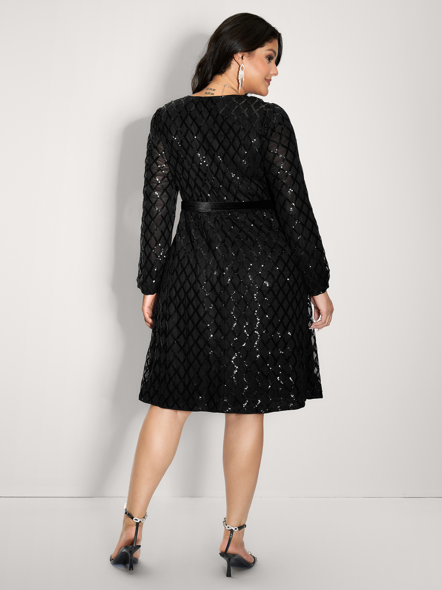 Side view of BloomChic Women's Plus Size Sheer Sequin Belted Stretchy Waist Midi Dress Black Party 10/M