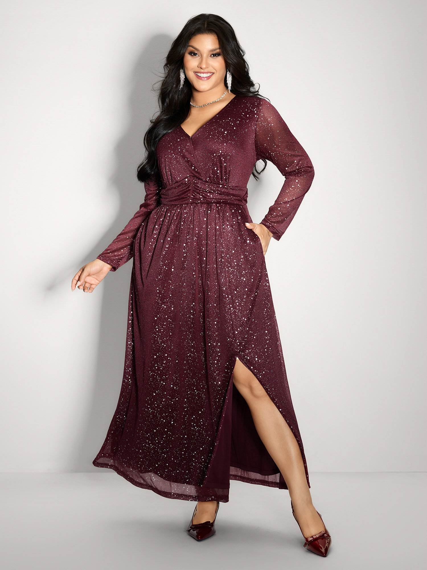 Side view of BloomChic Women's Plus Size Shimmery Hot Stamp Stretchy Slit Maxi Dress Burgundy Party Maxi Sequin 30/6X