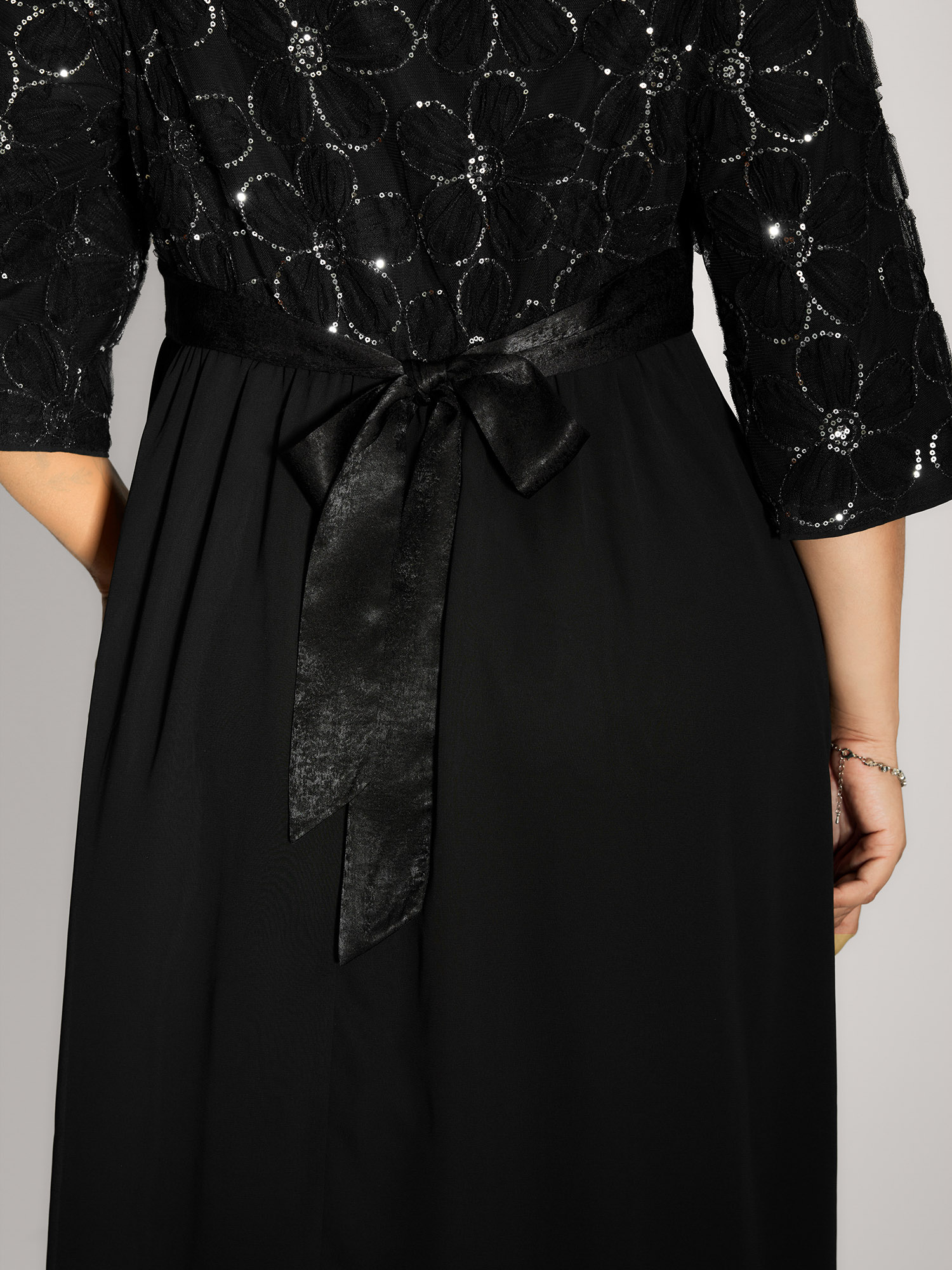 Side view of BloomChic Women's Plus Size Sequin Floral Tulle Shirred Waist Midi Dress Black Party Midi Colorblock Round Neck 22-24/3X