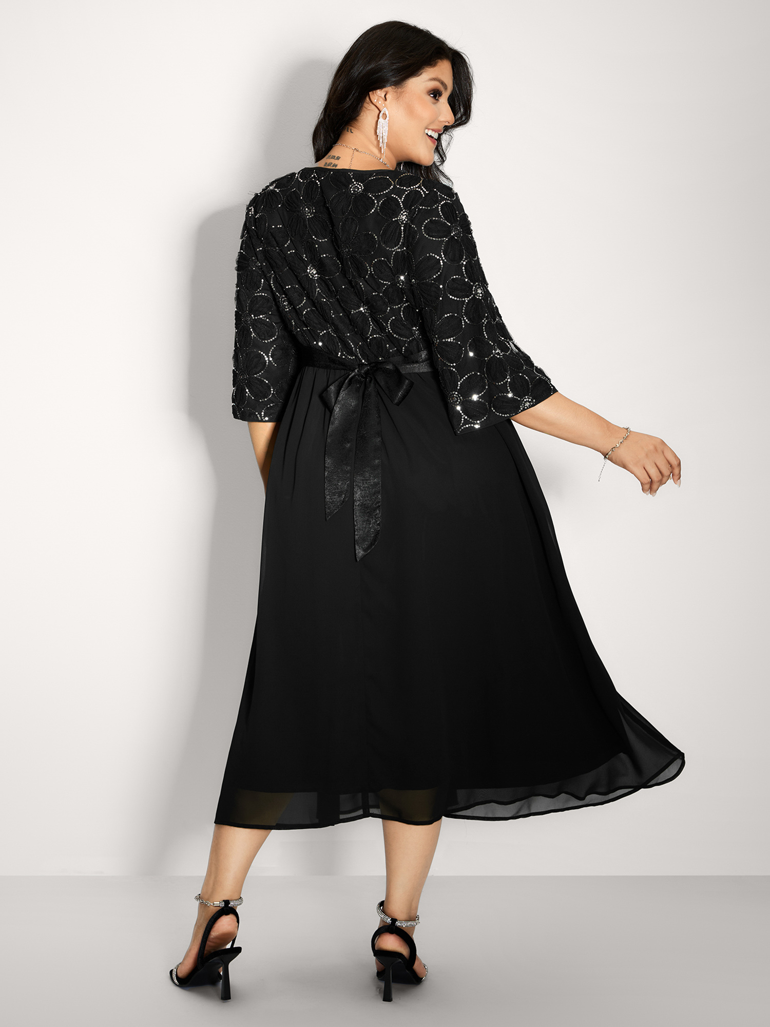 Side view of BloomChic Women's Plus Size Sequin Floral Tulle Shirred Waist Midi Dress Black Party Midi Colorblock Round Neck 22-24/3X