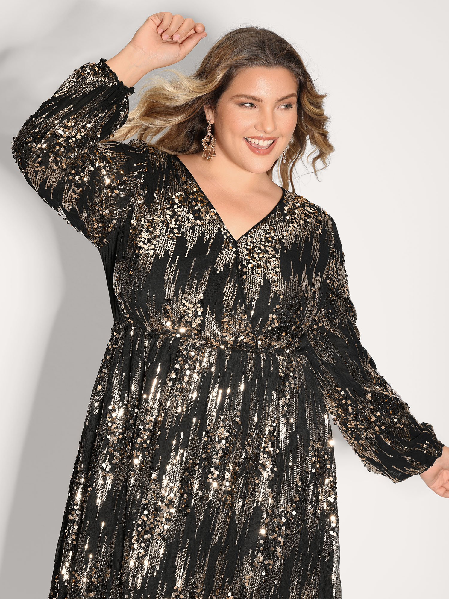 Side view of BloomChic Women's Plus Size Shimmery Gold Silver Sequin Wrap Party Dress Black Party 12/L