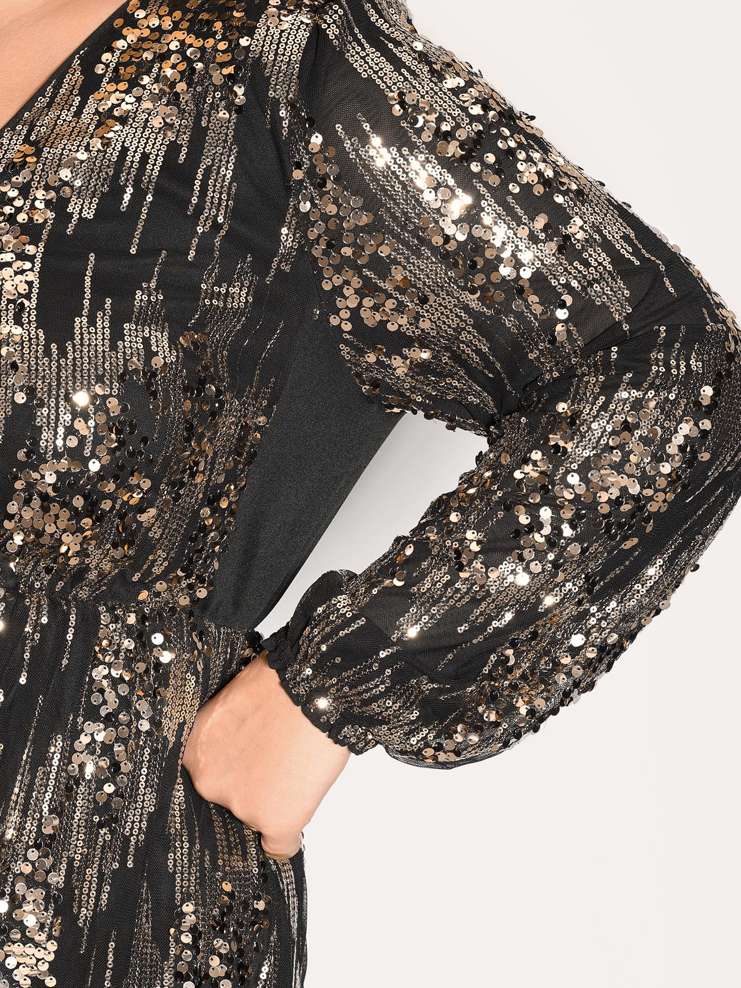 Side view of BloomChic Women's Plus Size Shimmery Gold Silver Sequin Wrap Party Dress Black Party 12/L