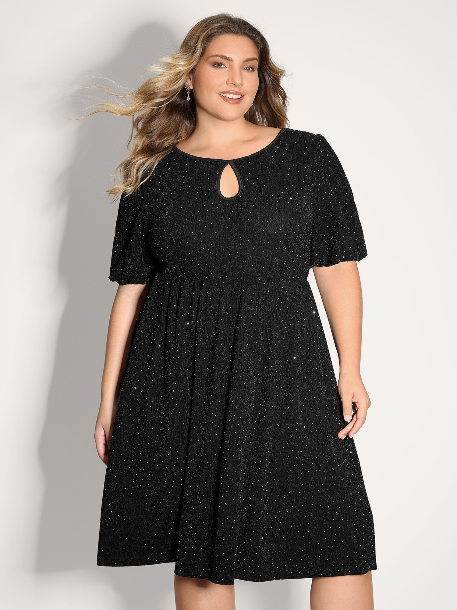 Side view of BloomChic Women's Plus Size Bowknot Rhinestone Pockets Mini Dress Black Party Knee 12/L