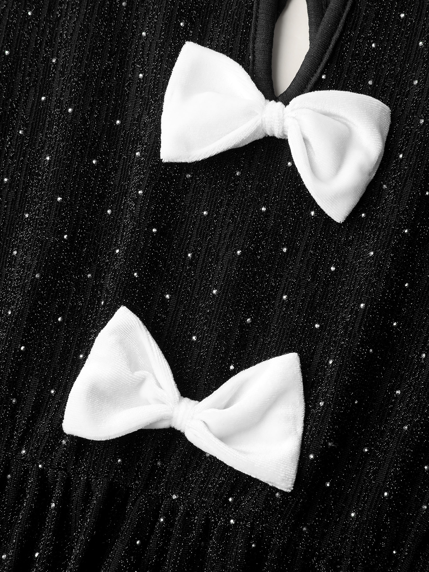 Side view of BloomChic Women's Plus Size Bowknot Rhinestone Pockets Mini Dress Black Party Knee 12/L