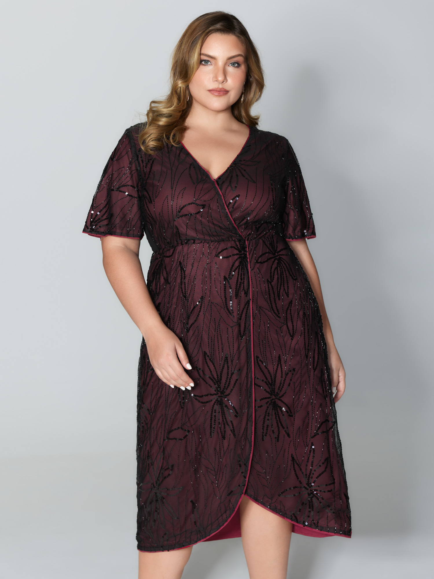 Side view of BloomChic Women's Plus Size Shimmery Sequin Embroidery Pockets Party Dress Burgundy Party Midi 22-24/3X