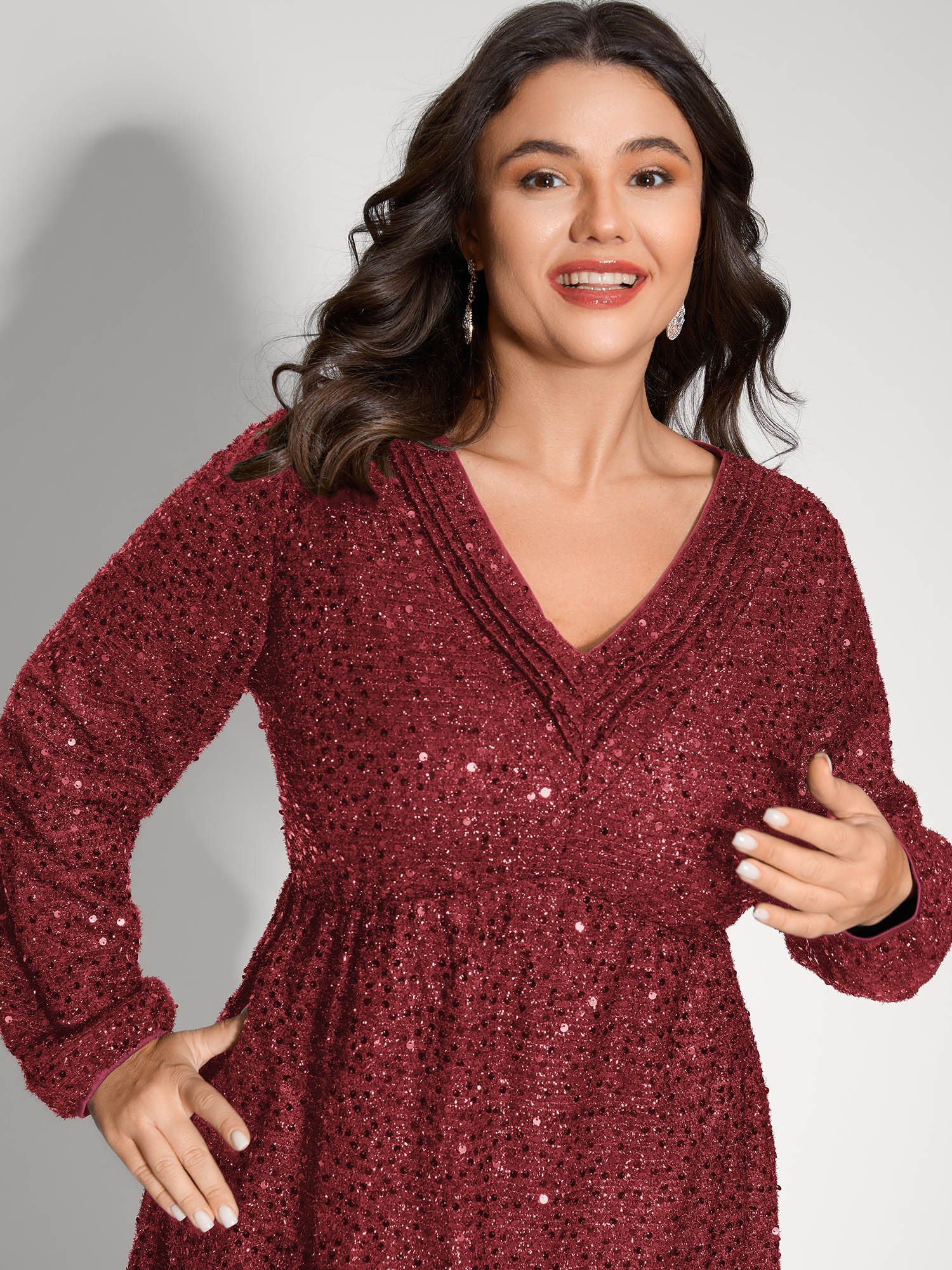 Side view of BloomChic Women's Plus Size Shimmery Sequin V-Neck Knee Dress Scarlet Party Smocked V-Neck 22-24/3X