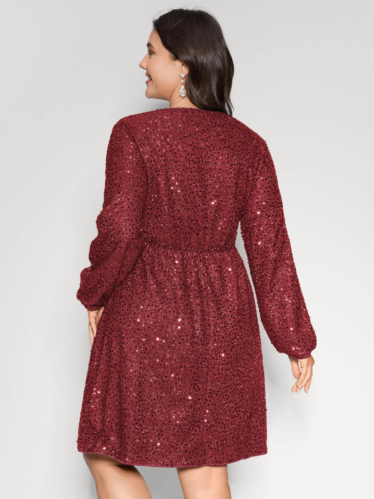 Side view of BloomChic Women's Plus Size Shimmery Sequin V-Neck Knee Dress Scarlet Party Smocked V-Neck 22-24/3X